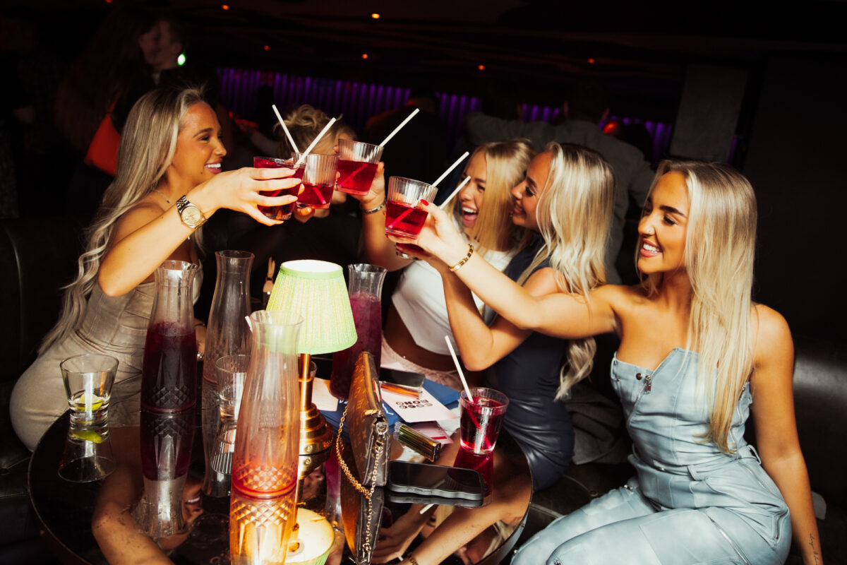 Exclusively Yours lounge at a high-energy post-conference mixer, ideal for professional networking.