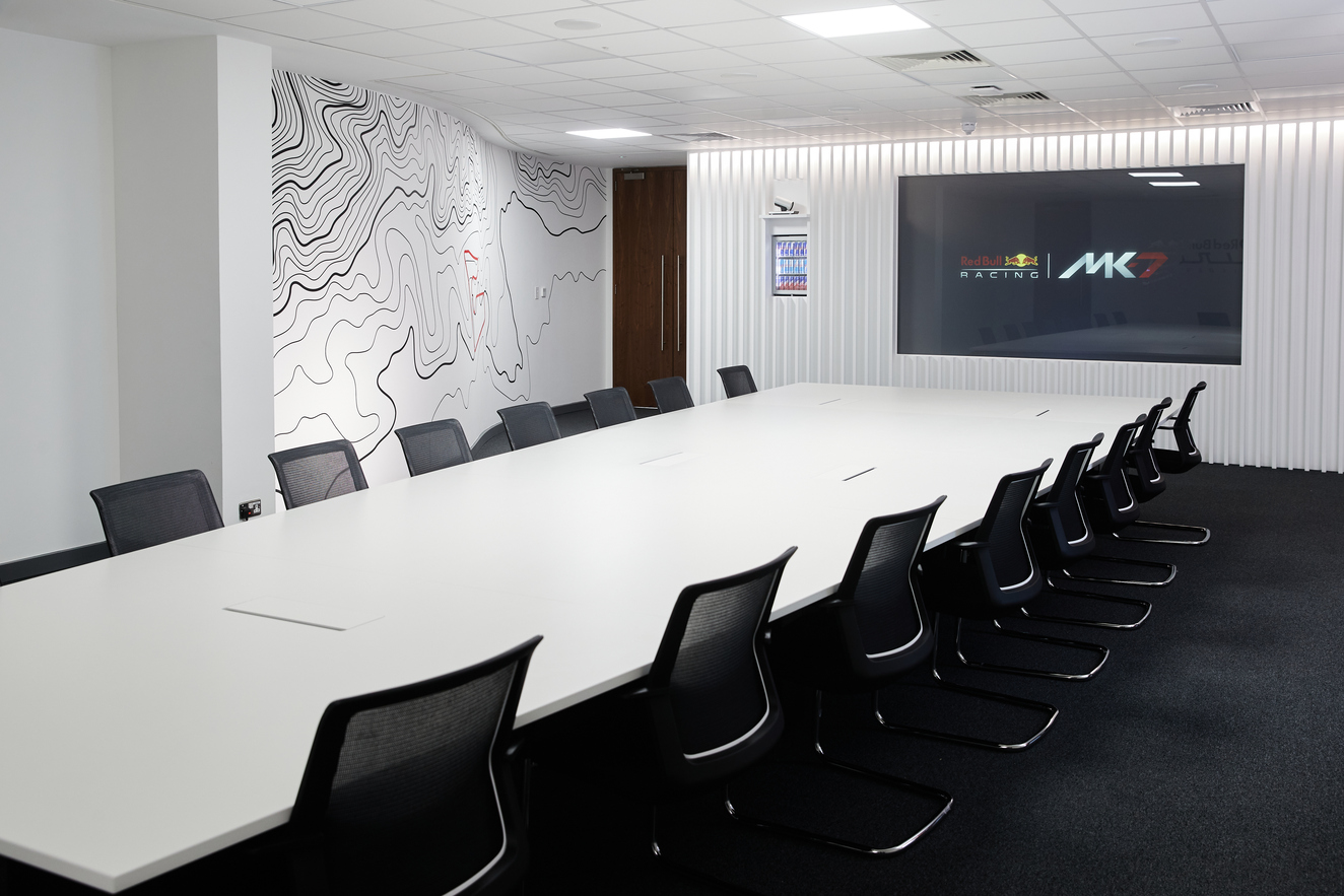 Red Bull Ring Boardroom: modern conference room for Formula One team meetings.