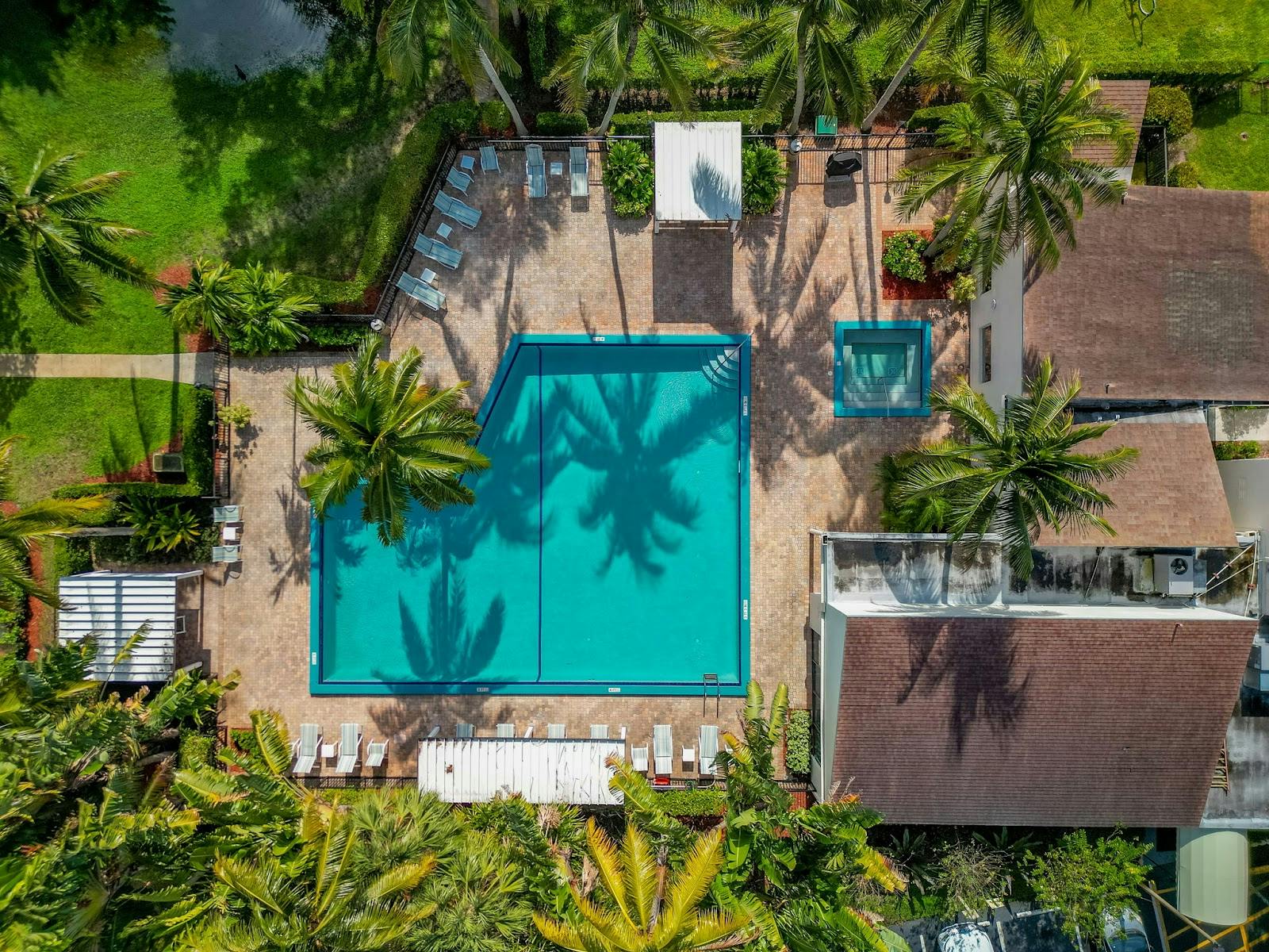 Clubhouse pool deck with lounge seating for incentive trips and corporate networking events.