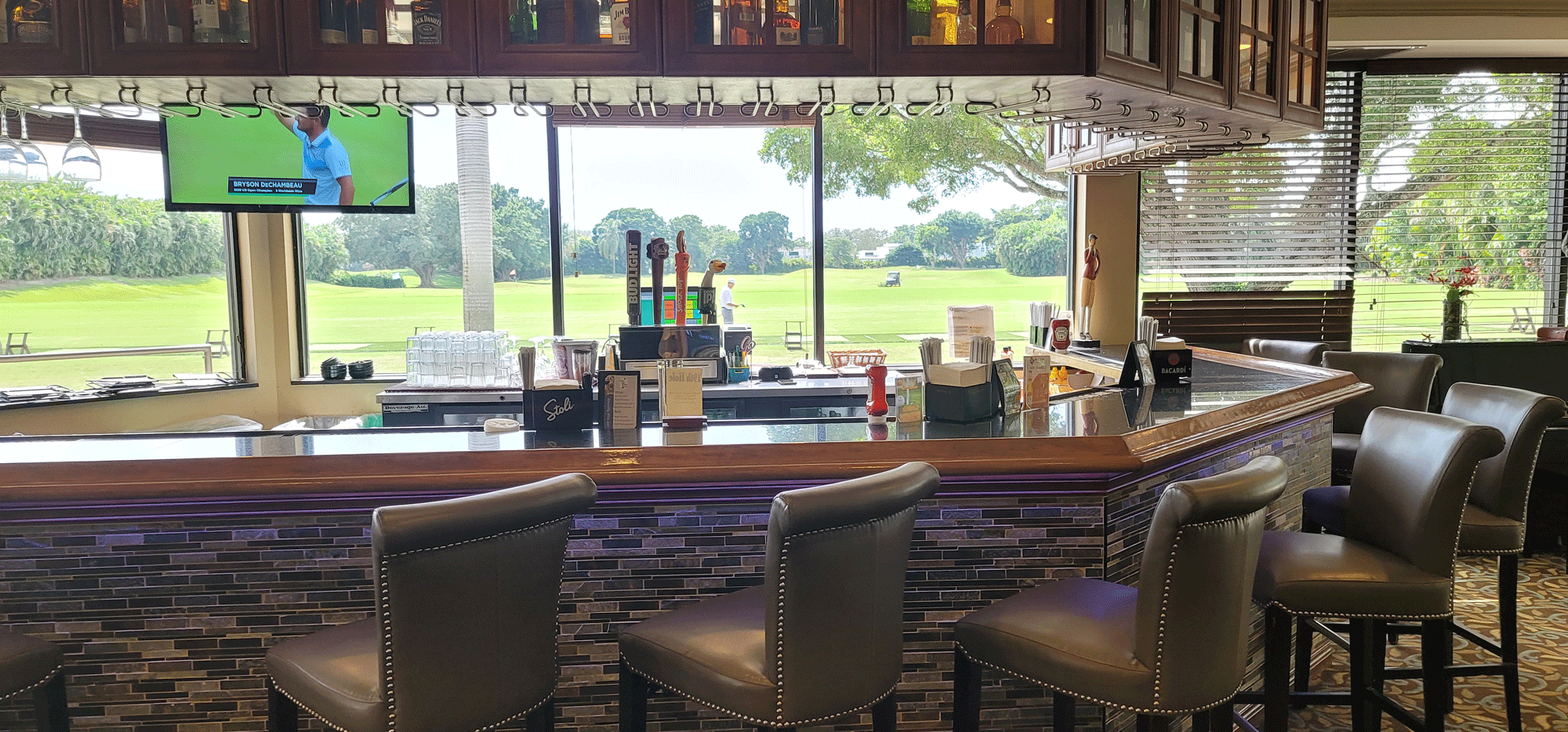 Clubhouse bar at Jacaranda Club for golf networking and corporate event receptions.