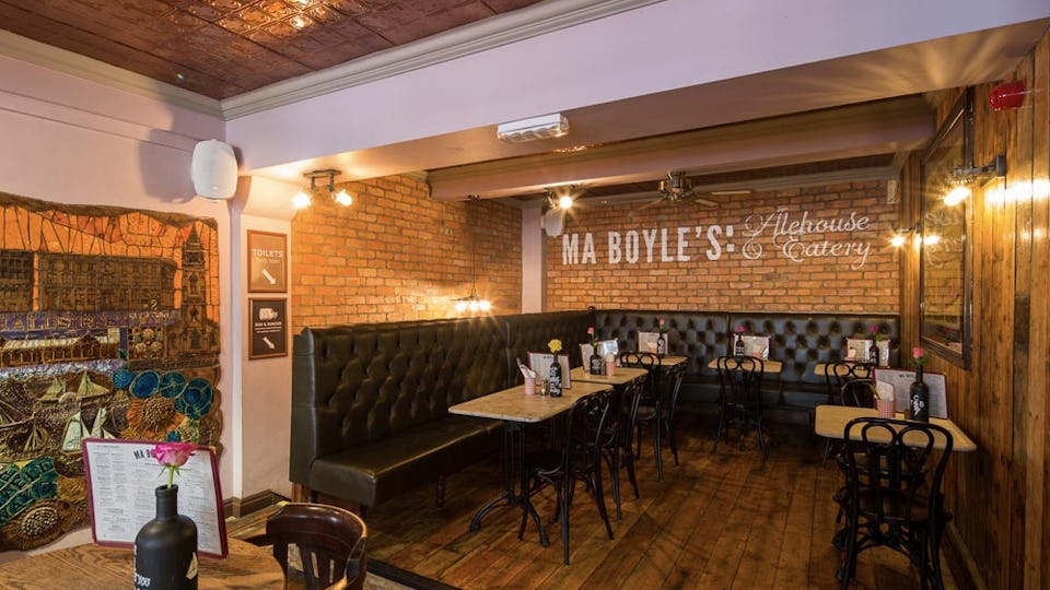 Cozy Basement Bar at Ma Boyle's ideal for private dinners and networking events.