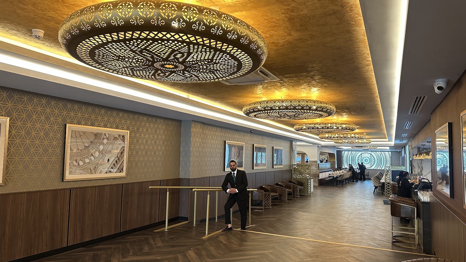 Royal Nawaab Pyramid banquet hall with gold lighting for upscale corporate reception events.