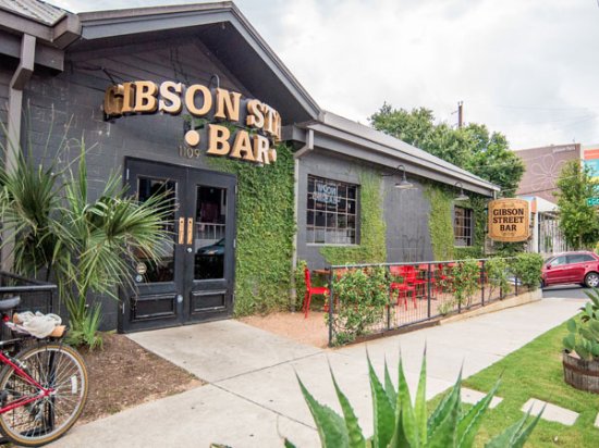 Gibson Street Bar storefront with outdoor patio, ideal for post-conference happy hours and events.