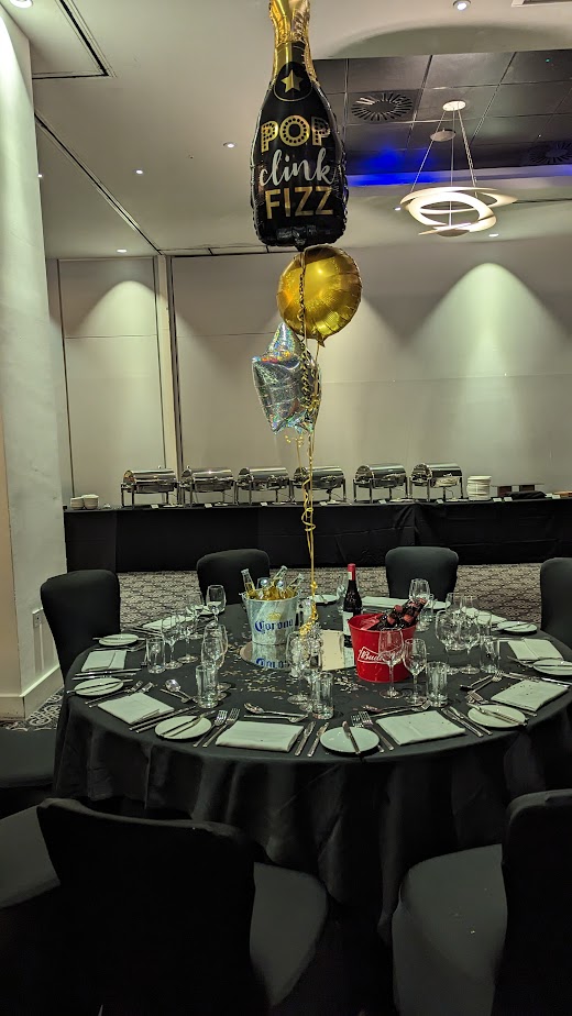 Elegant banquet table in Azzurro 2 Suite, Radisson Blu, for a festive celebration.