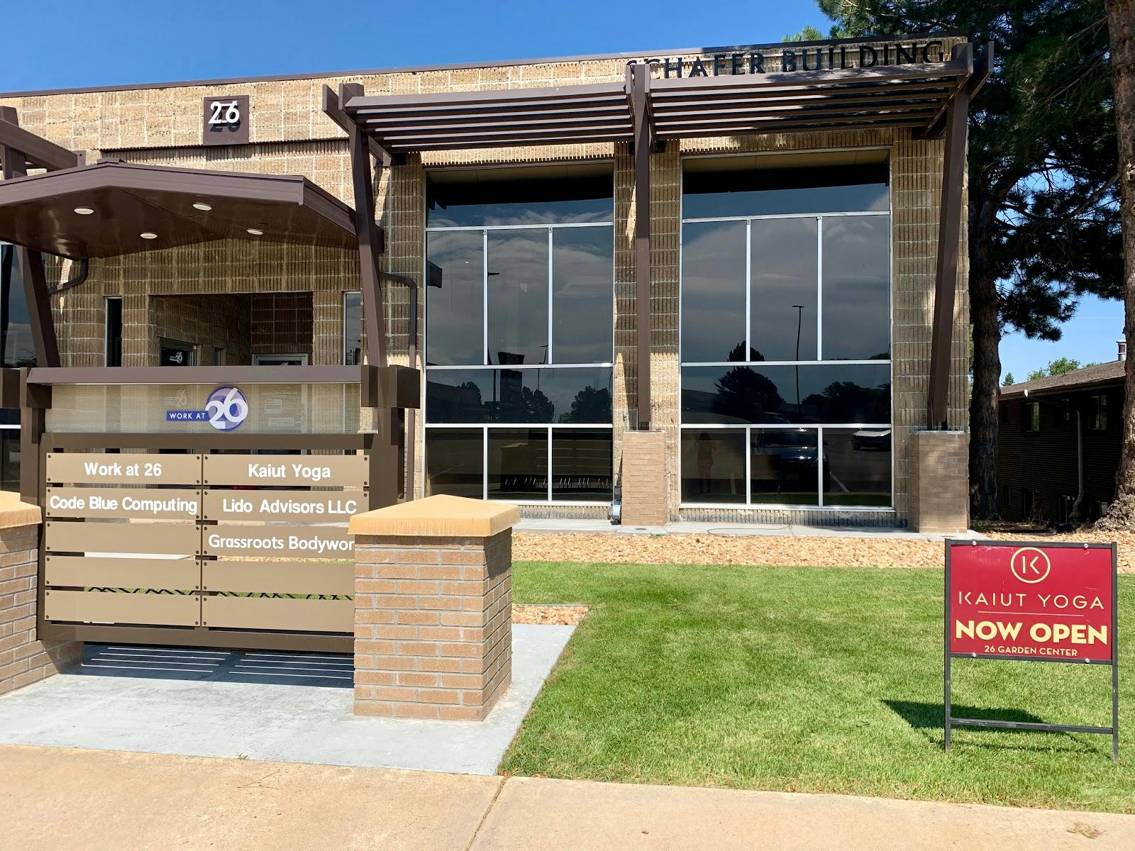 Infinity One Yoga studio exterior, office park location for corporate wellness meetings.