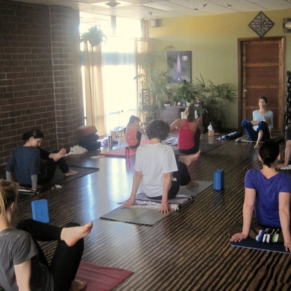 Yoga studio with natural light, perfect for wellness retreats and intimate group workshops.