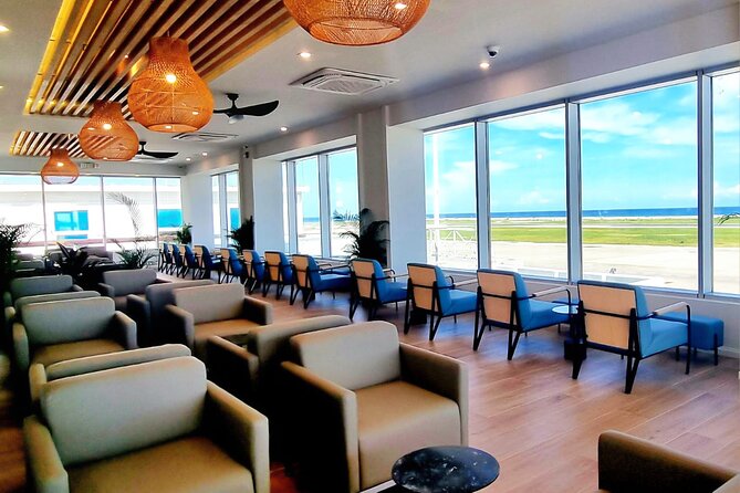 VIP lounge with coastal views and modular seating for corporate event networking.