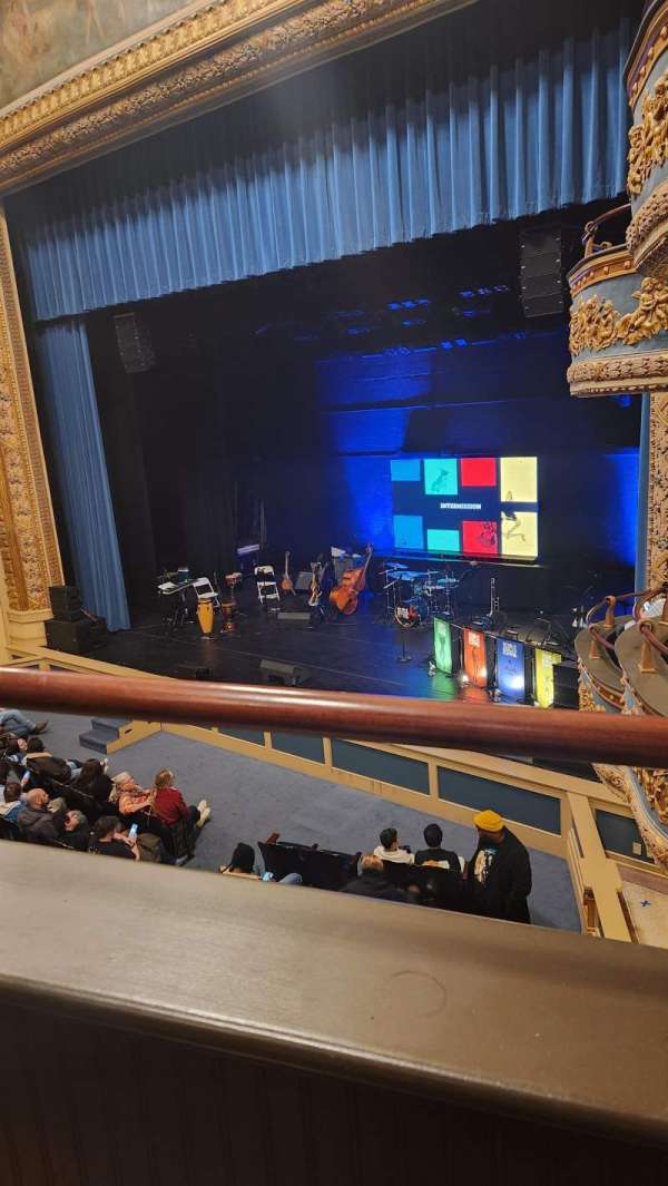 Lyric Theatre stage at intermission: theater event venue with digital backdrop.