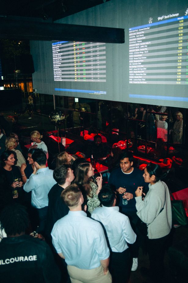 Networking mixer at Stocks Bar, low-light event space for professional social gatherings.