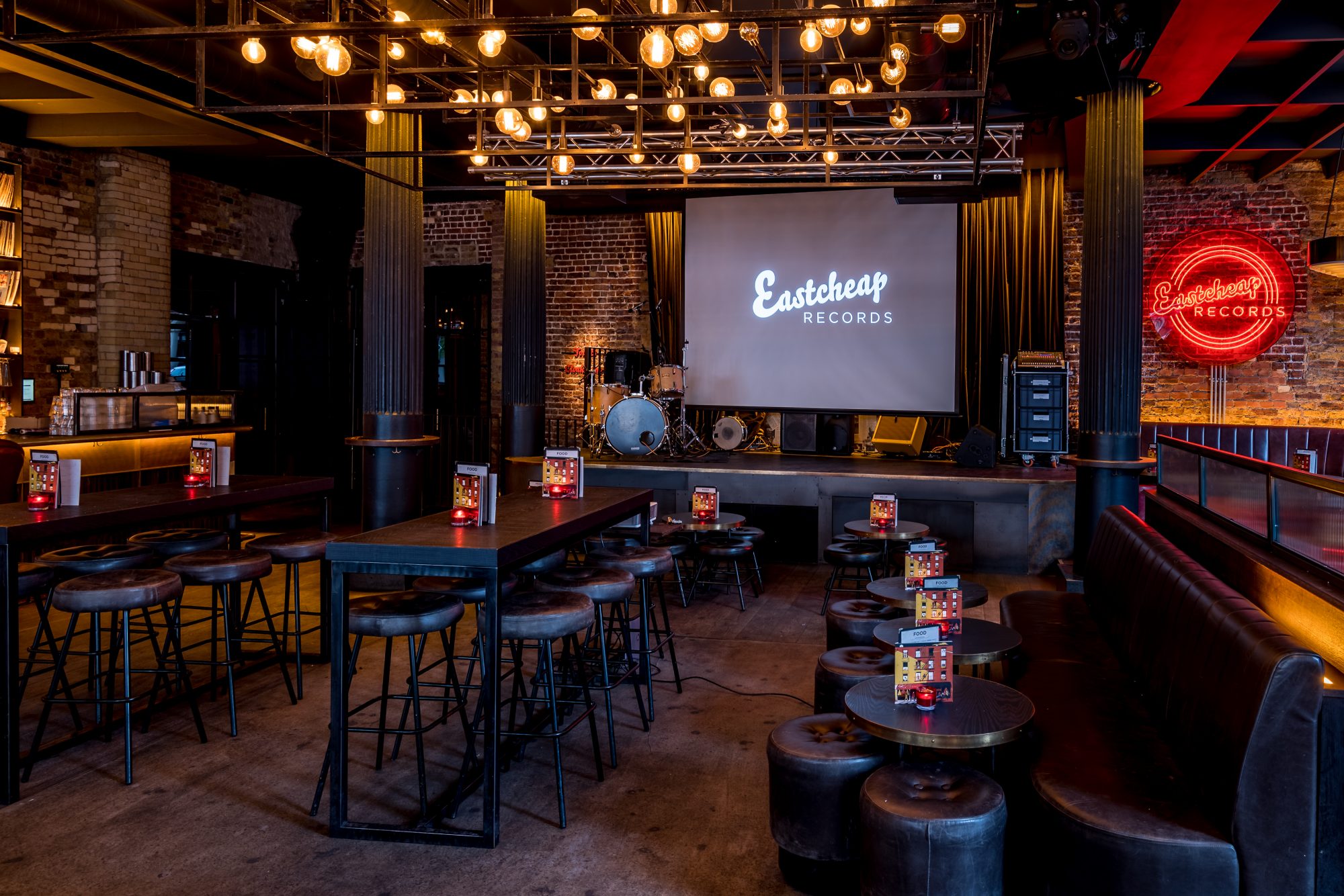 Versatile event space in Eastcheap Records with industrial aesthetics for corporate gatherings.