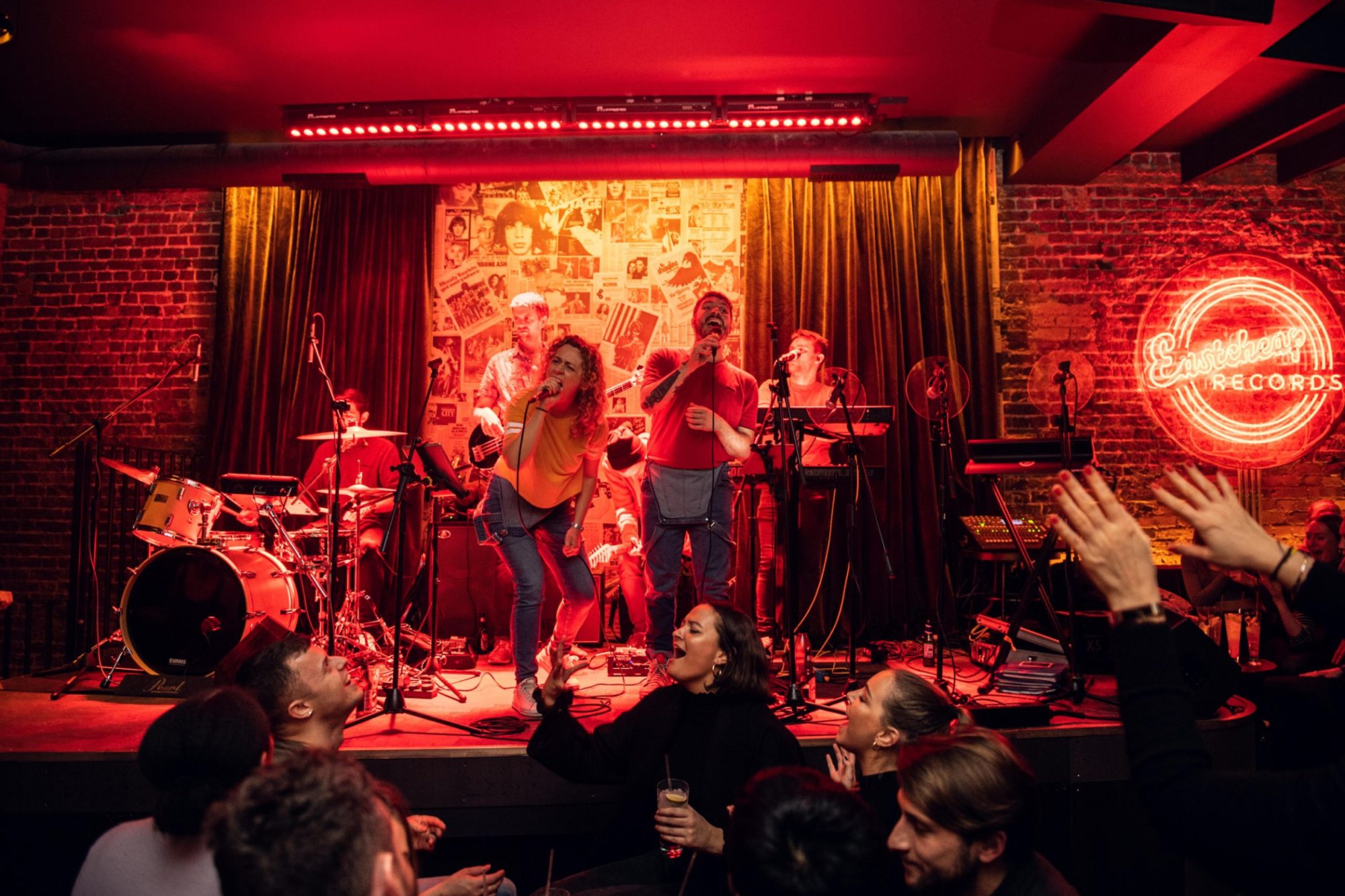 Vibrant live performance in Eastcheap Records' green room, ideal for social mixers.