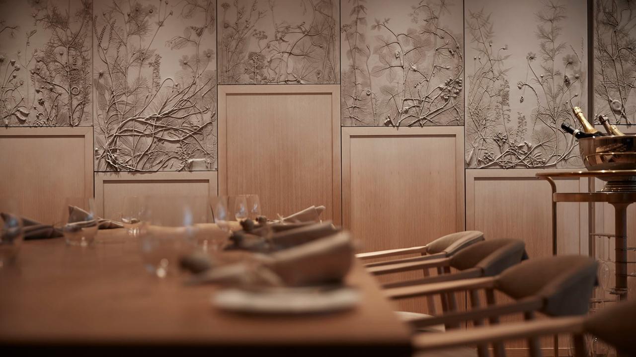 Sophisticated dining setup in Hide & Seek Room for corporate events and intimate meetings.