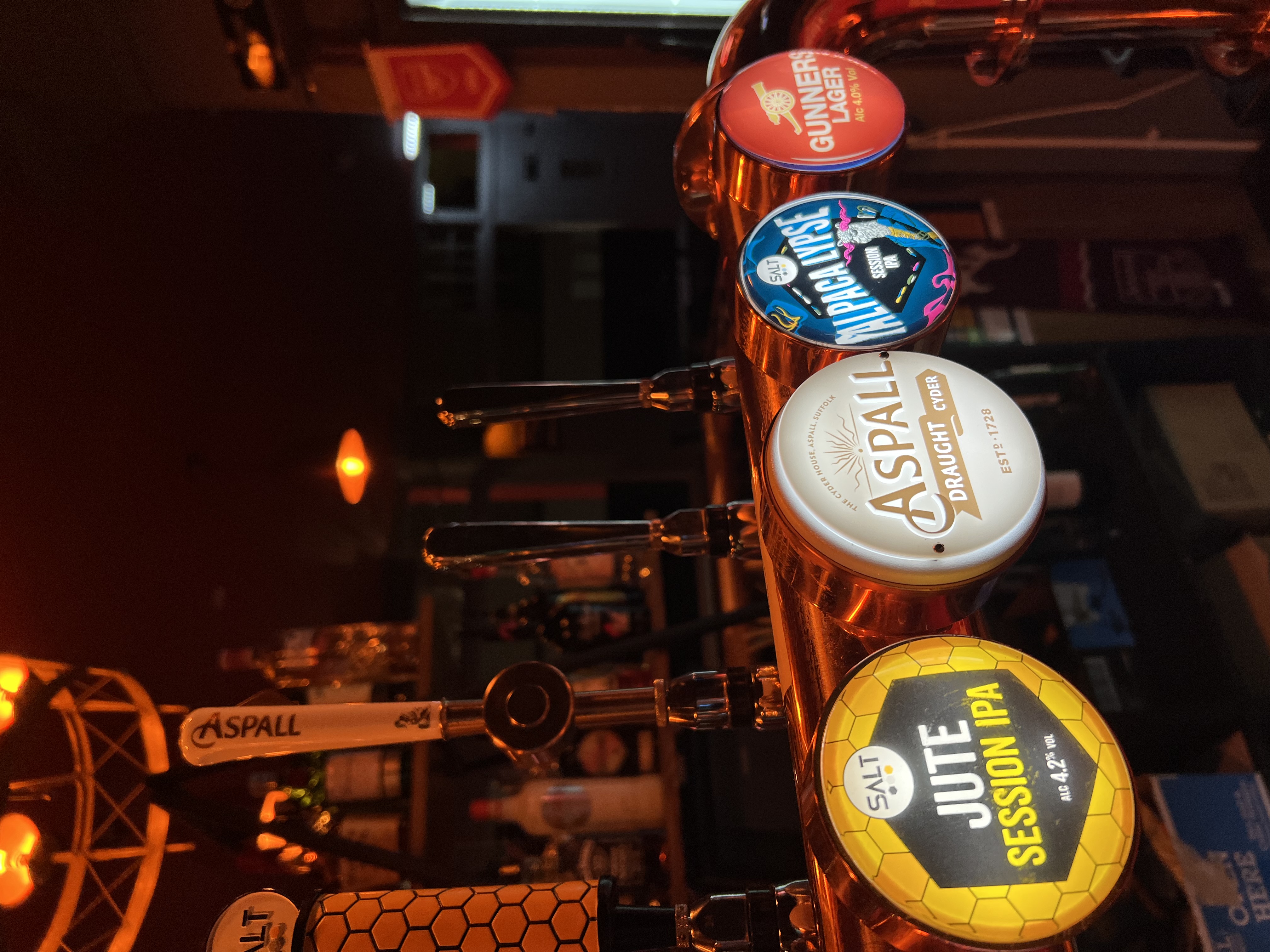 Low-lit bar at The George Pub, ideal for networking events and corporate receptions.