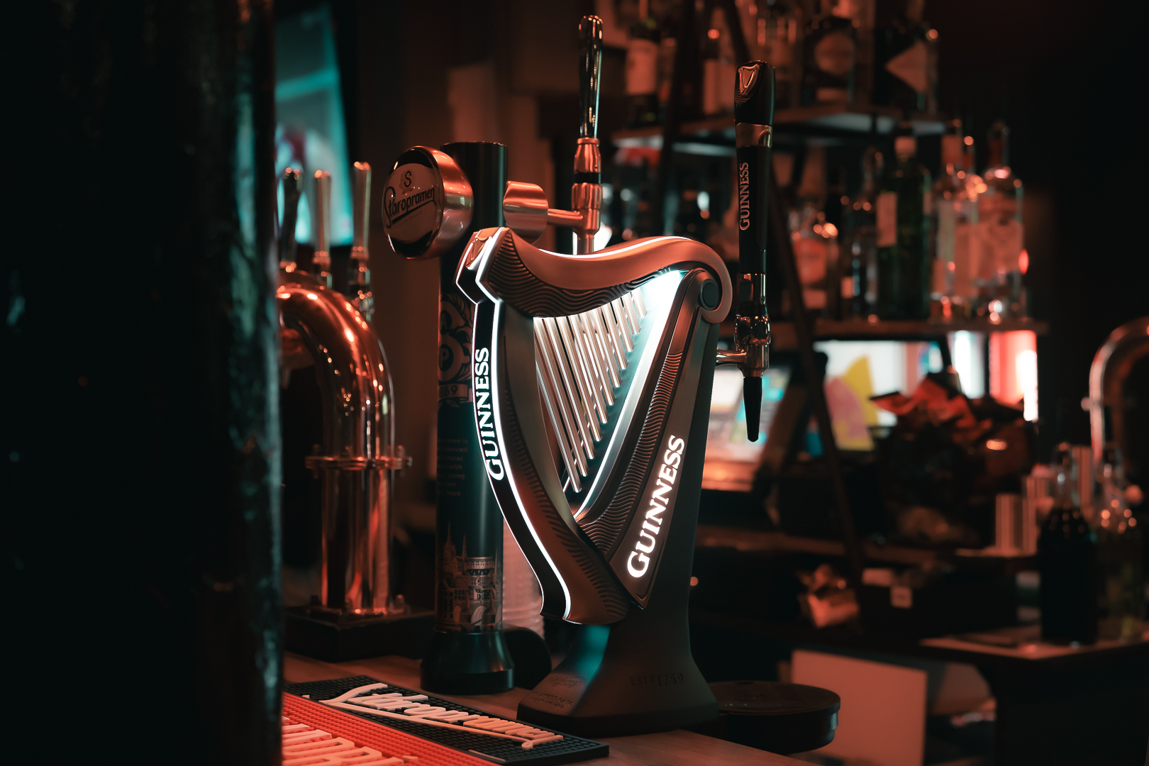 The George Pub bar: dimly lit, cozy venue for networking receptions and team socials.