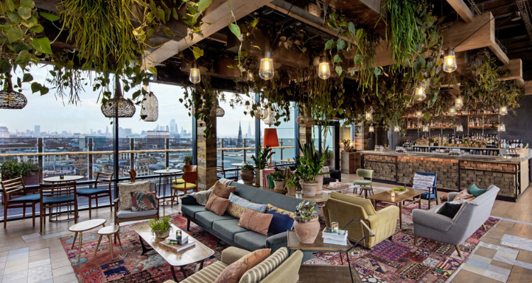 Rooftop terrace at Treehouse Hotel London for upscale meetings and events, with city skyline views.