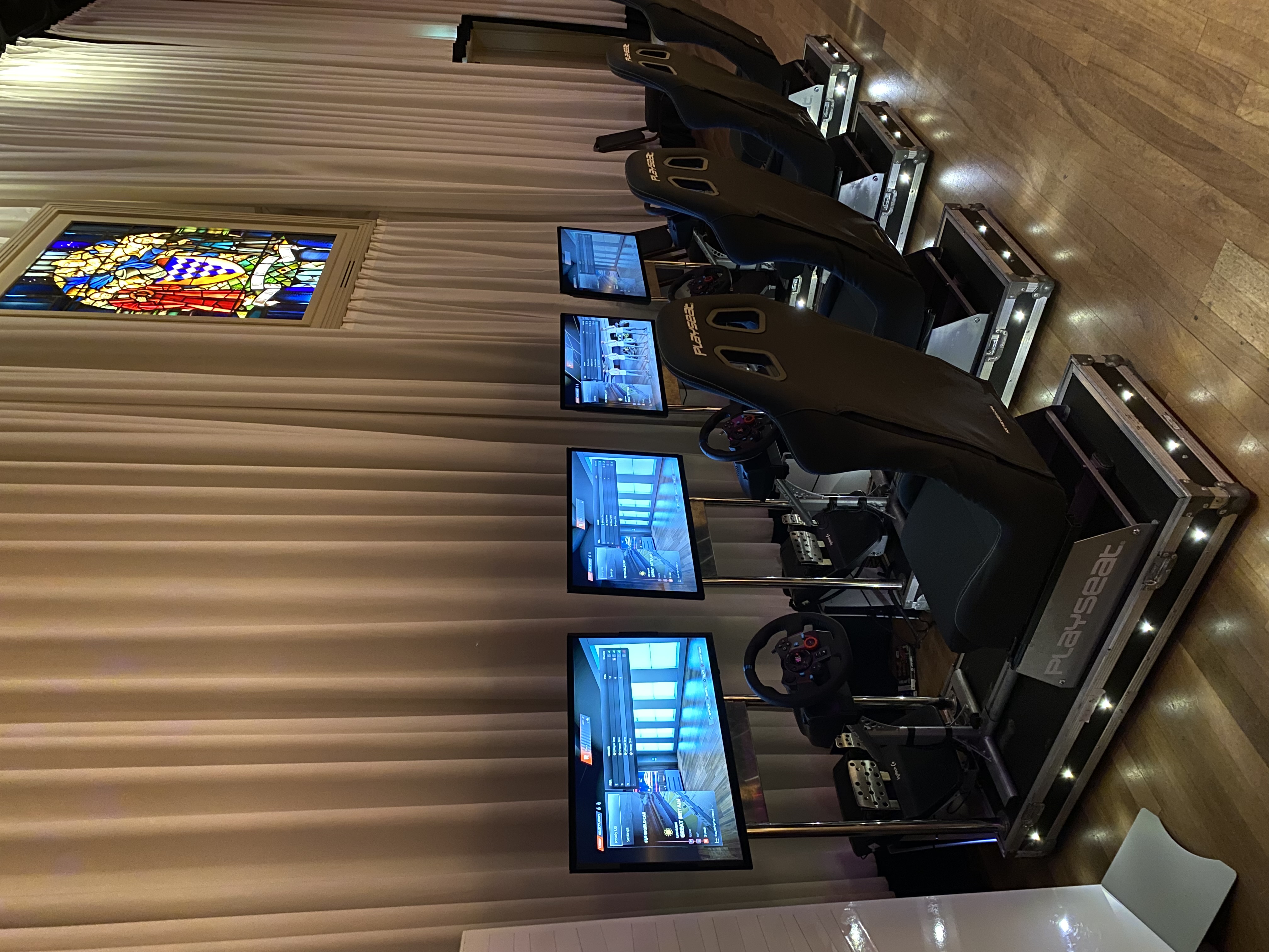 Modern gaming setup with racing simulators at Exclusive Venue Hire for corporate events.