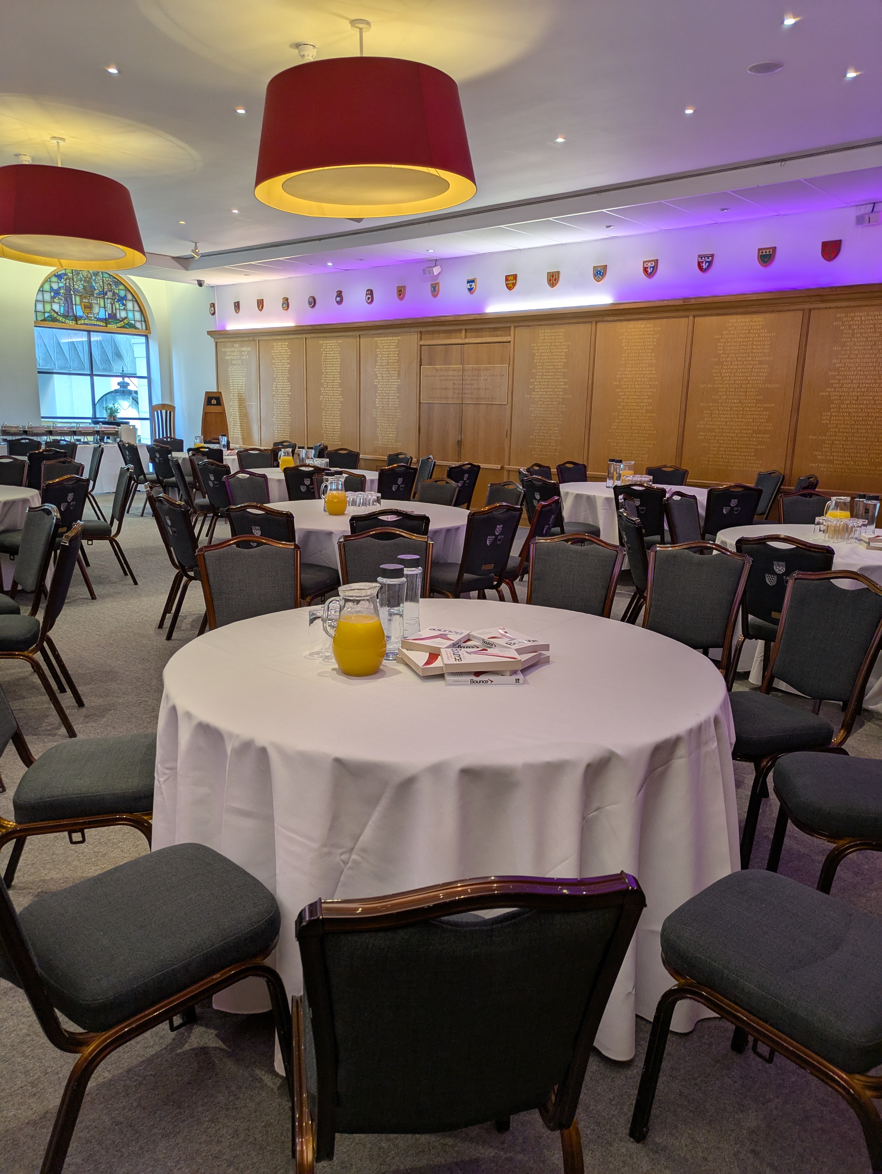 Exclusive Venue Hire at Glaziers Hall with round tables set for corporate meetings.
