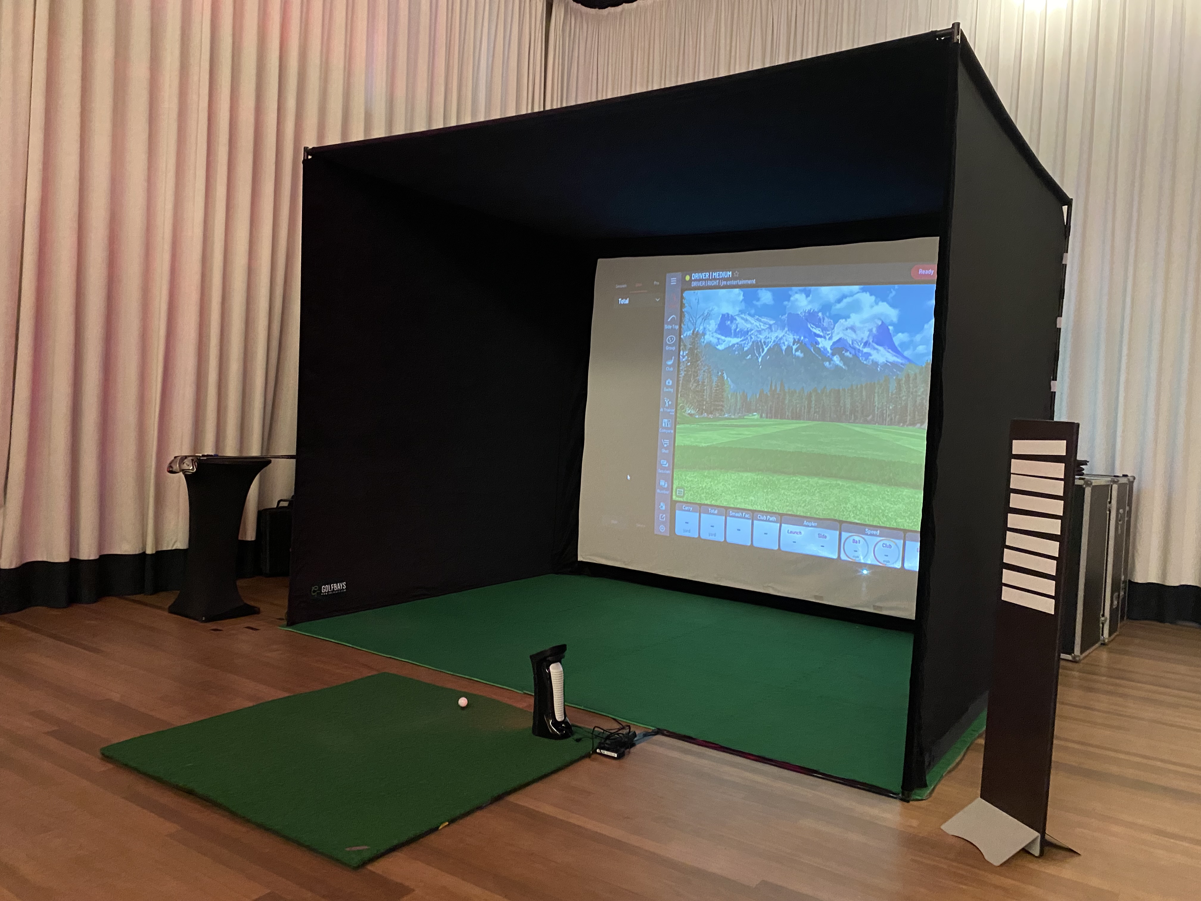 Virtual golf simulator in sleek Glaziers Hall venue for corporate events and team-building.