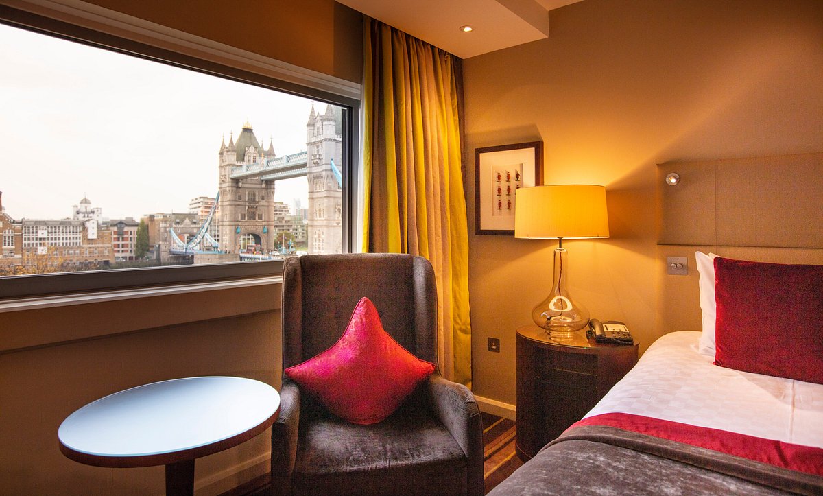 Stylish hotel room with Tower Bridge view, ideal for corporate events and accommodations.