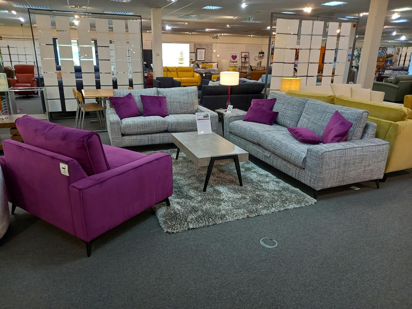 VIP breakout lounge at Cranmore Park with purple accents for intimate corporate event networking.