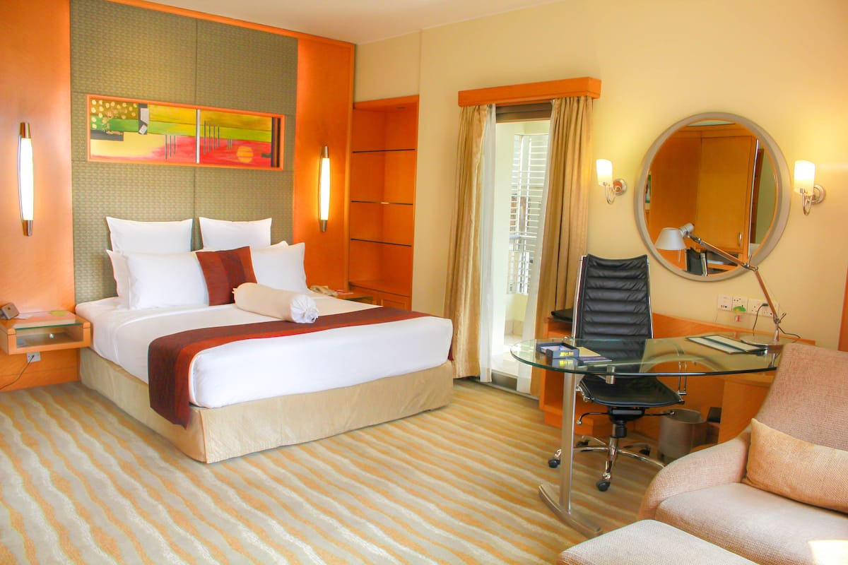 Gulshan Suite with ergonomic workstation for business travel and bleisure stays.