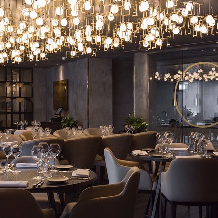 Opheem private dining room: moody upscale interior for corporate dinners and networking events.