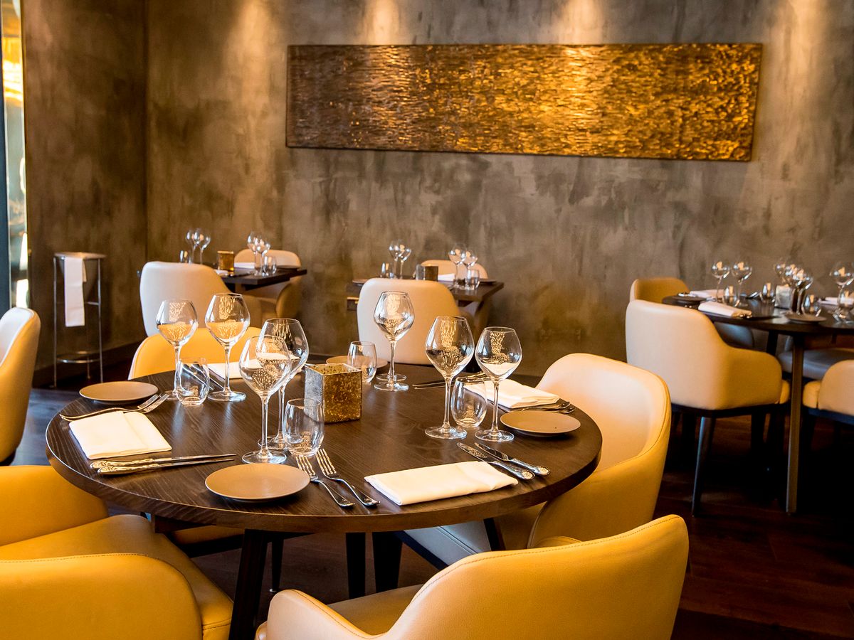 Opheem private dining room with elegant tabletop setup for VIP dinners and networking events.