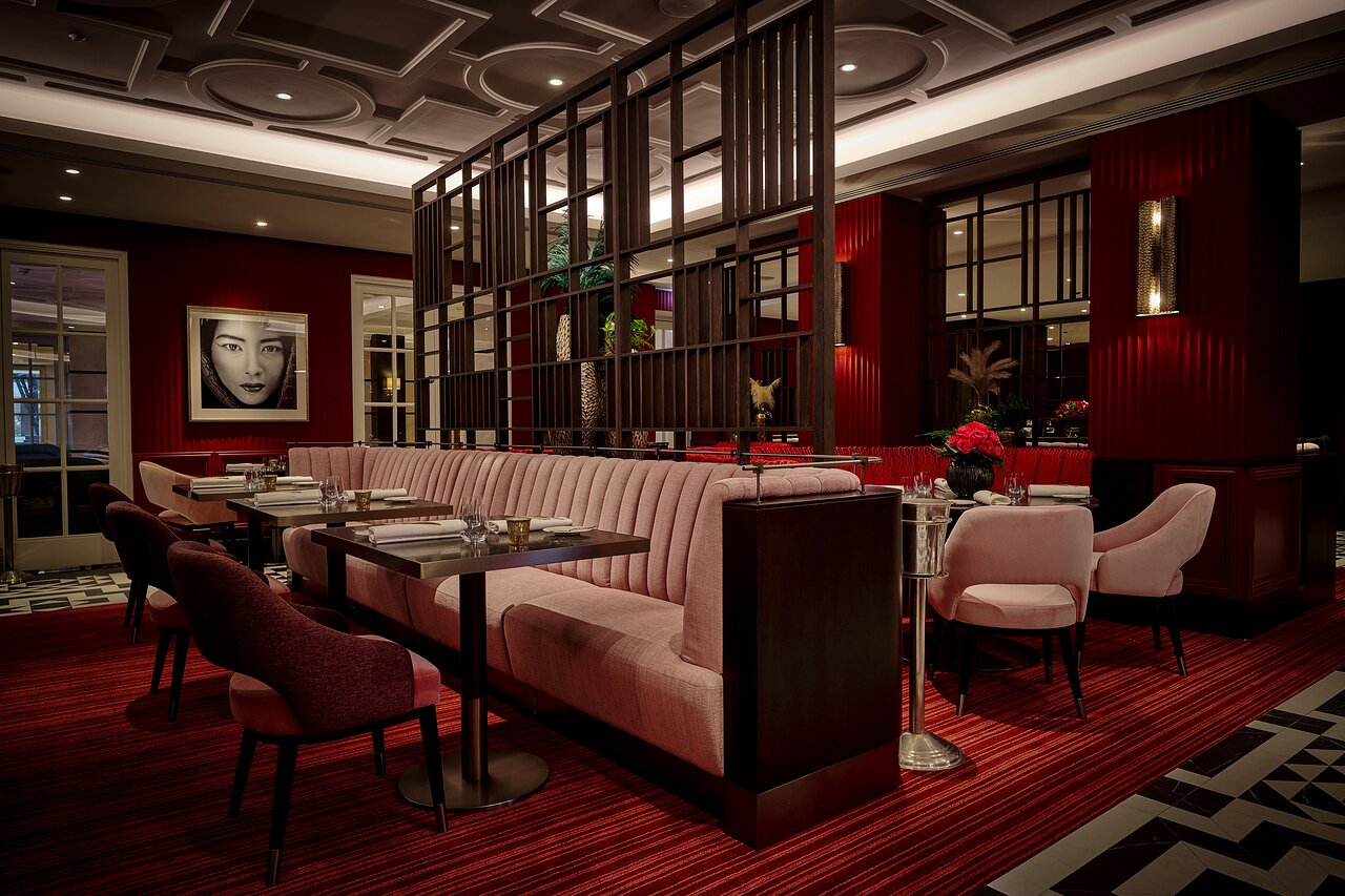 Elegant restaurant bar with plush seating, perfect for corporate meetings and networking events.