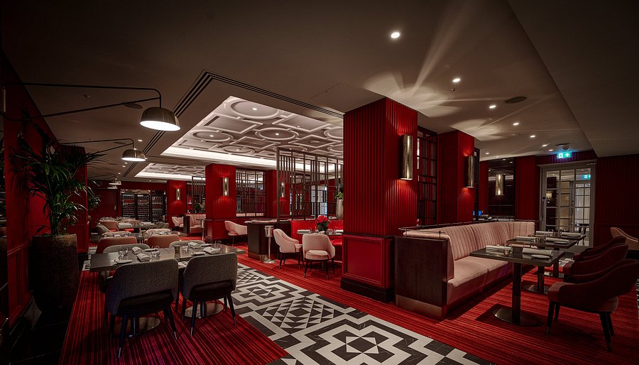 Sophisticated Pem restaurant bar with modern decor for intimate events and networking.