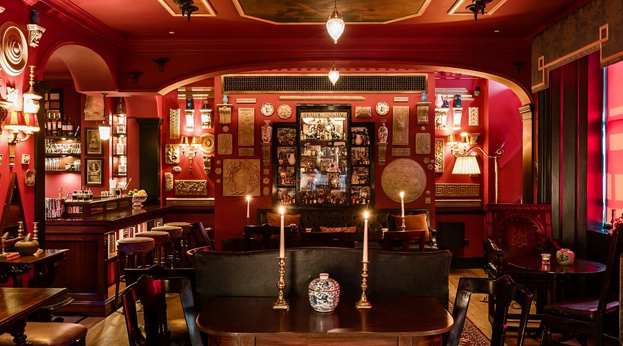Intimate venue at The Zetter Marylebone with rich red decor for exclusive events.
