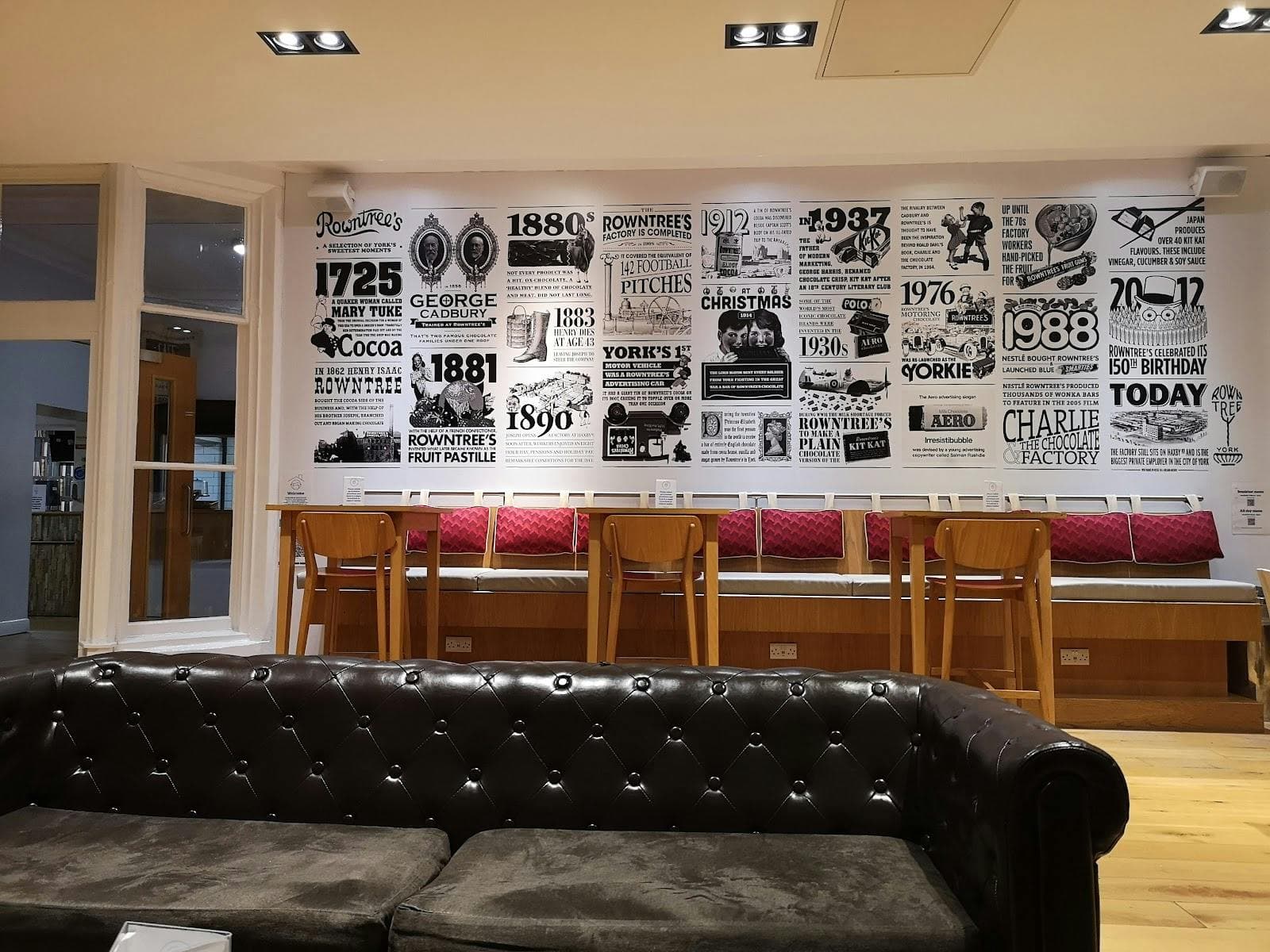 YHA York meeting room with mural and lounge seating for corporate events and team workshops.
