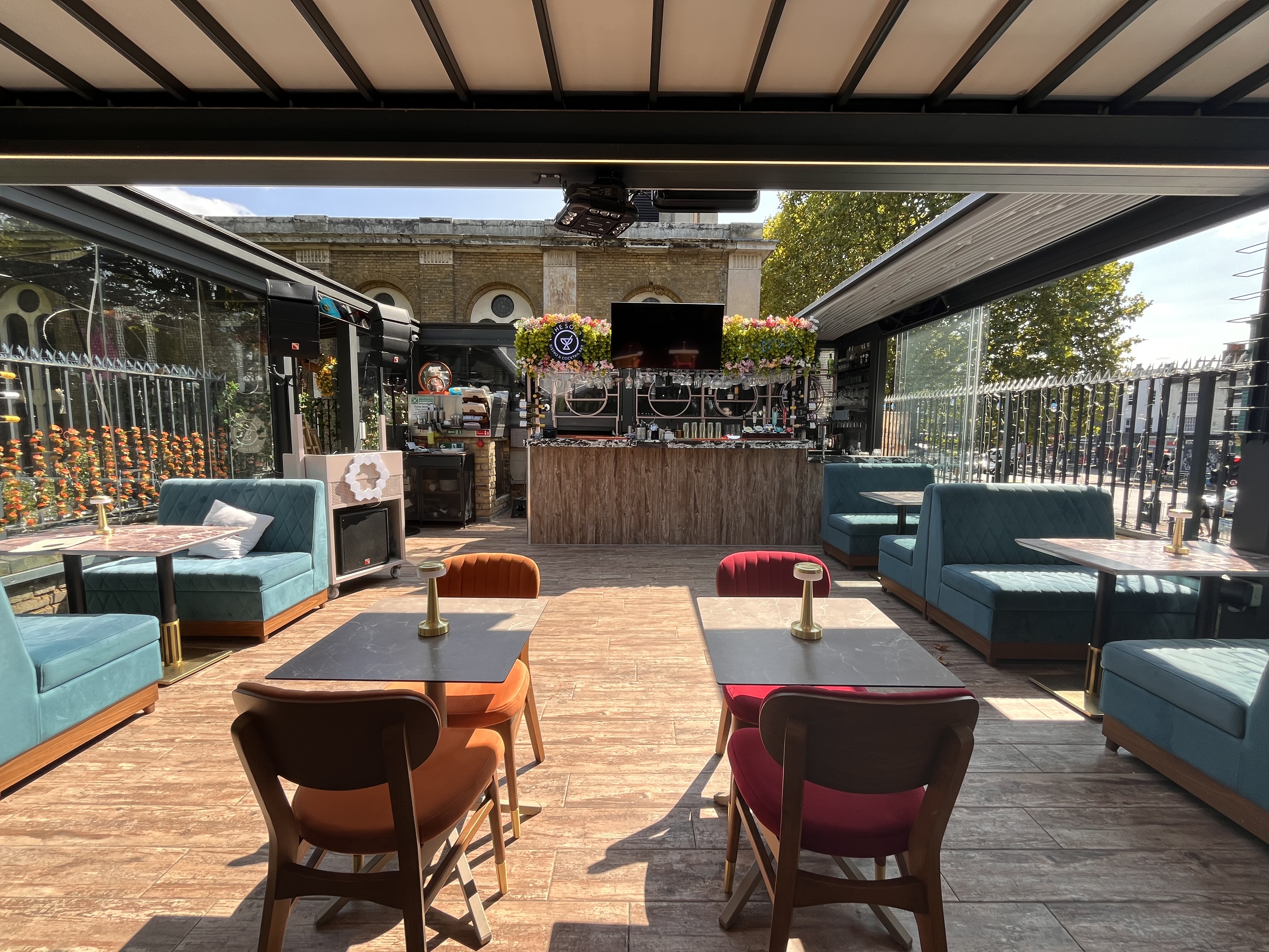 Vibrant outdoor event venue with stylish seating for meetings and gatherings.