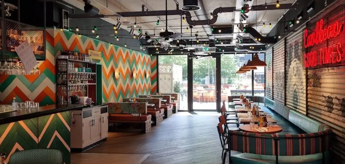 Private upstairs seating area at Turtle Bay Hammersmith, perfect for meetings and events.