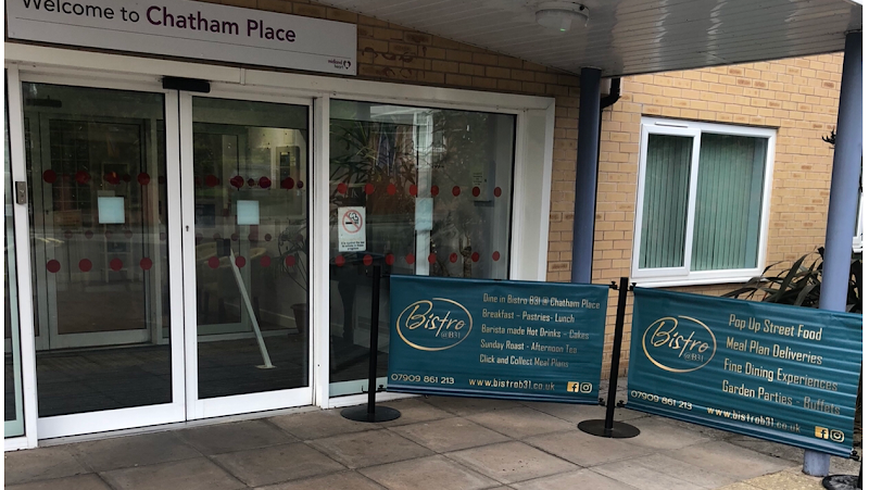 Bistro @B31 venue entrance with tension signage for corporate events and catering.