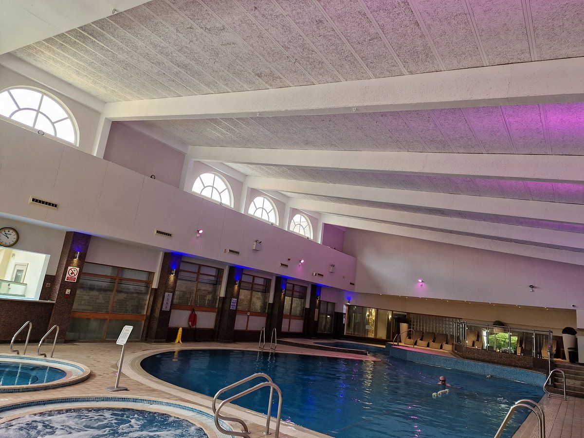Spacious indoor pool at The Belfry spa, ideal for events and gatherings.