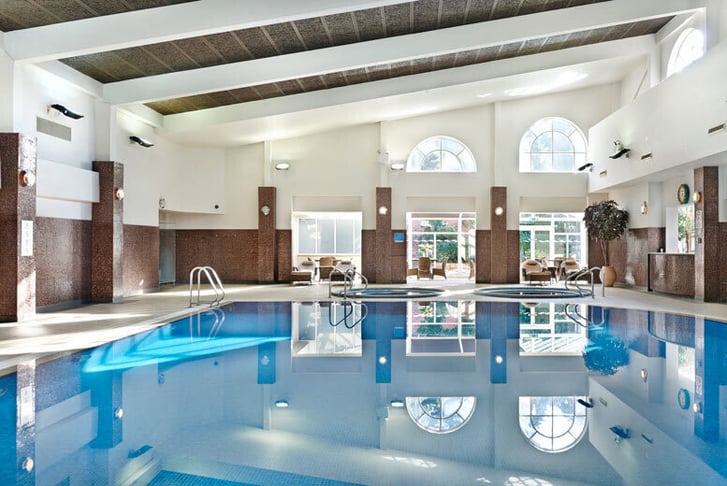 Elegant indoor pool at The Belfry spa, perfect for upscale events and retreats.