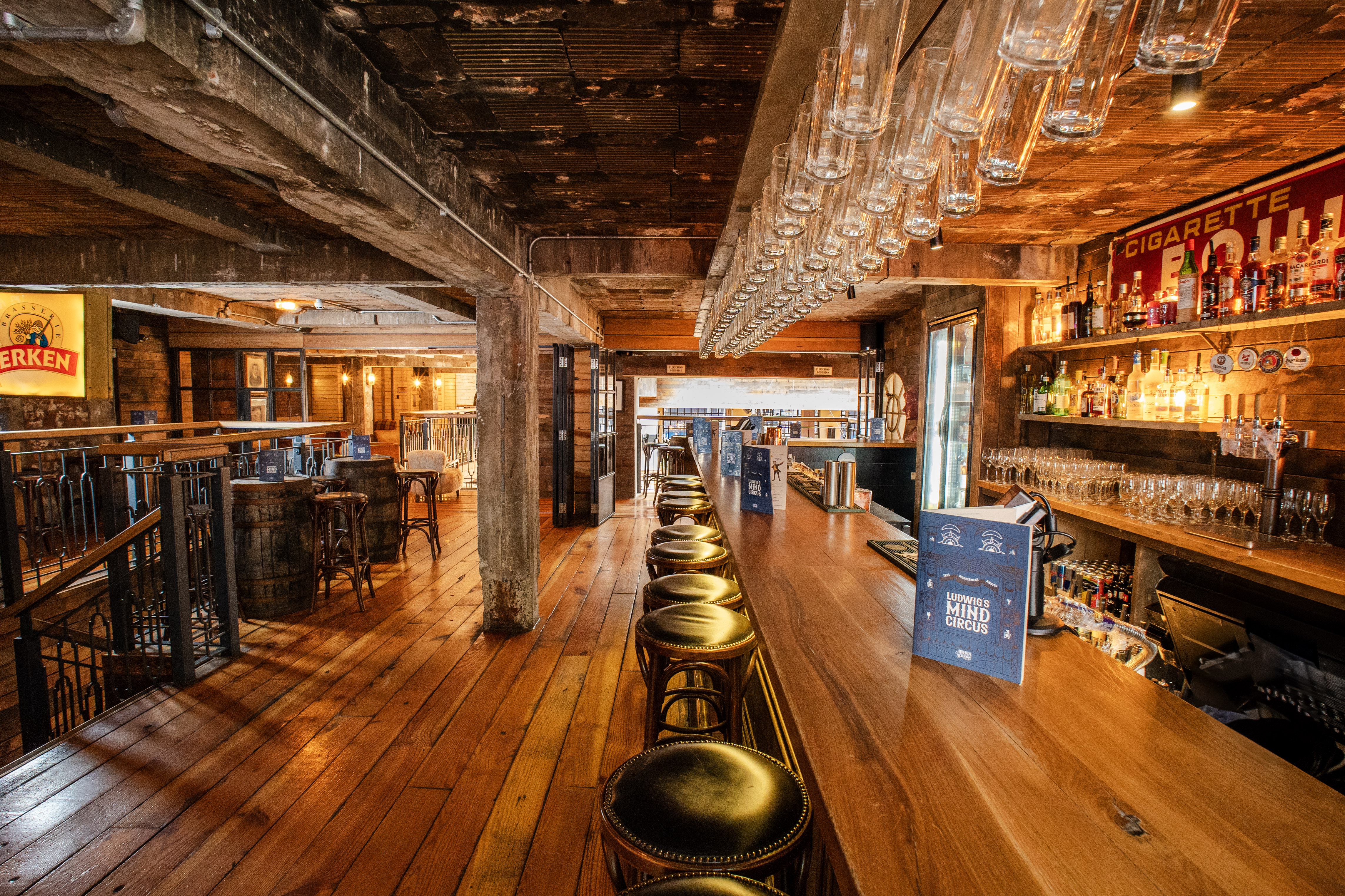 Ludwig's Tavern rustic bar with industrial decor for networking mixer and conference reception.
