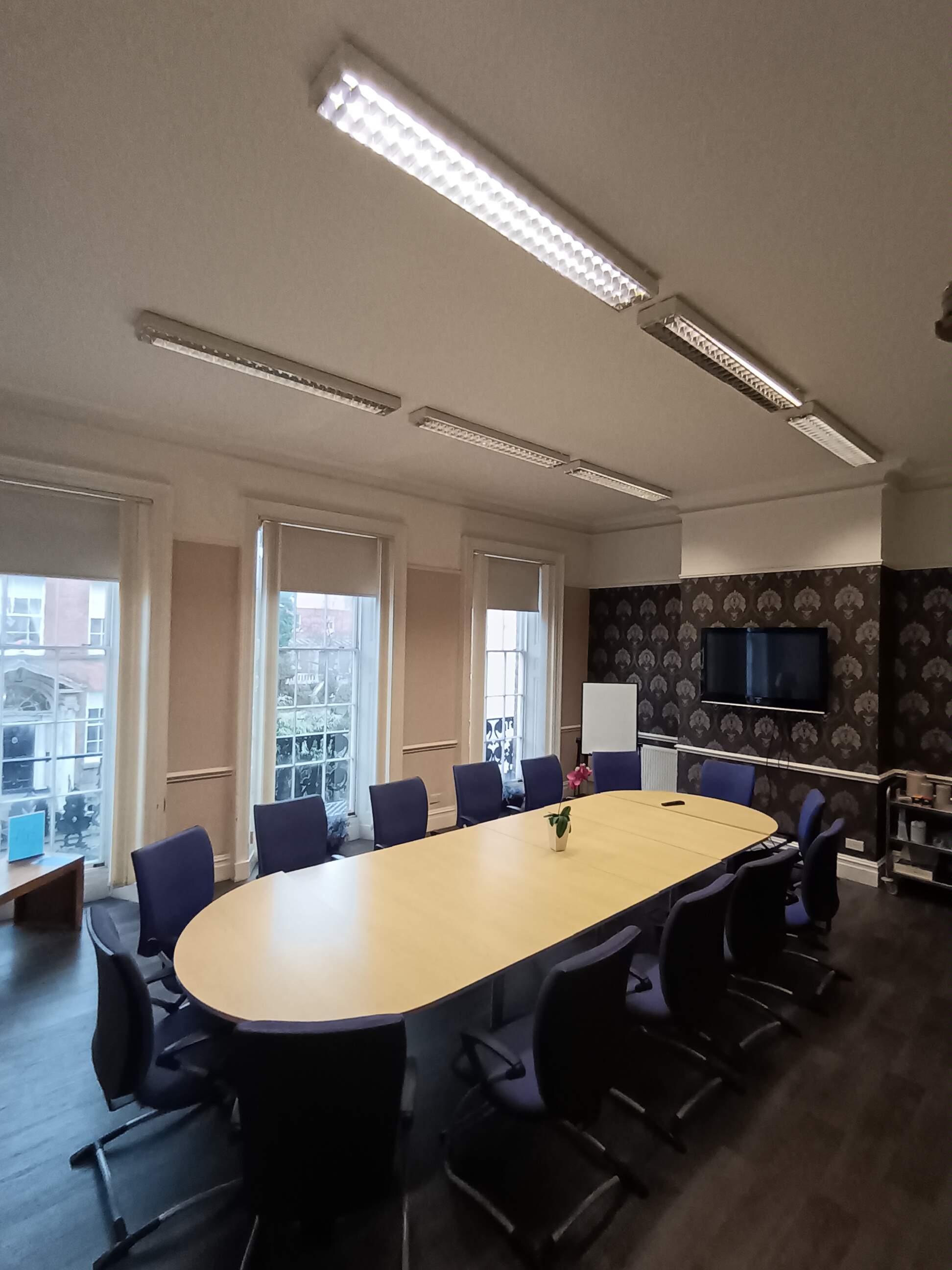 Boardroom in Rodney Chambers with oval table, ideal for meetings and presentations.