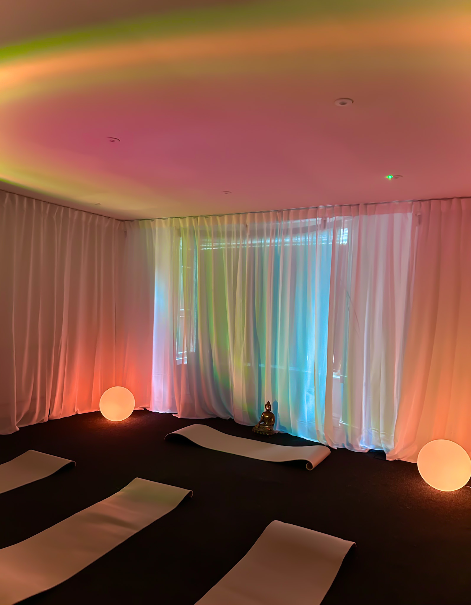 Serene Wellness Studio with calming lighting for retreats and meditation events.