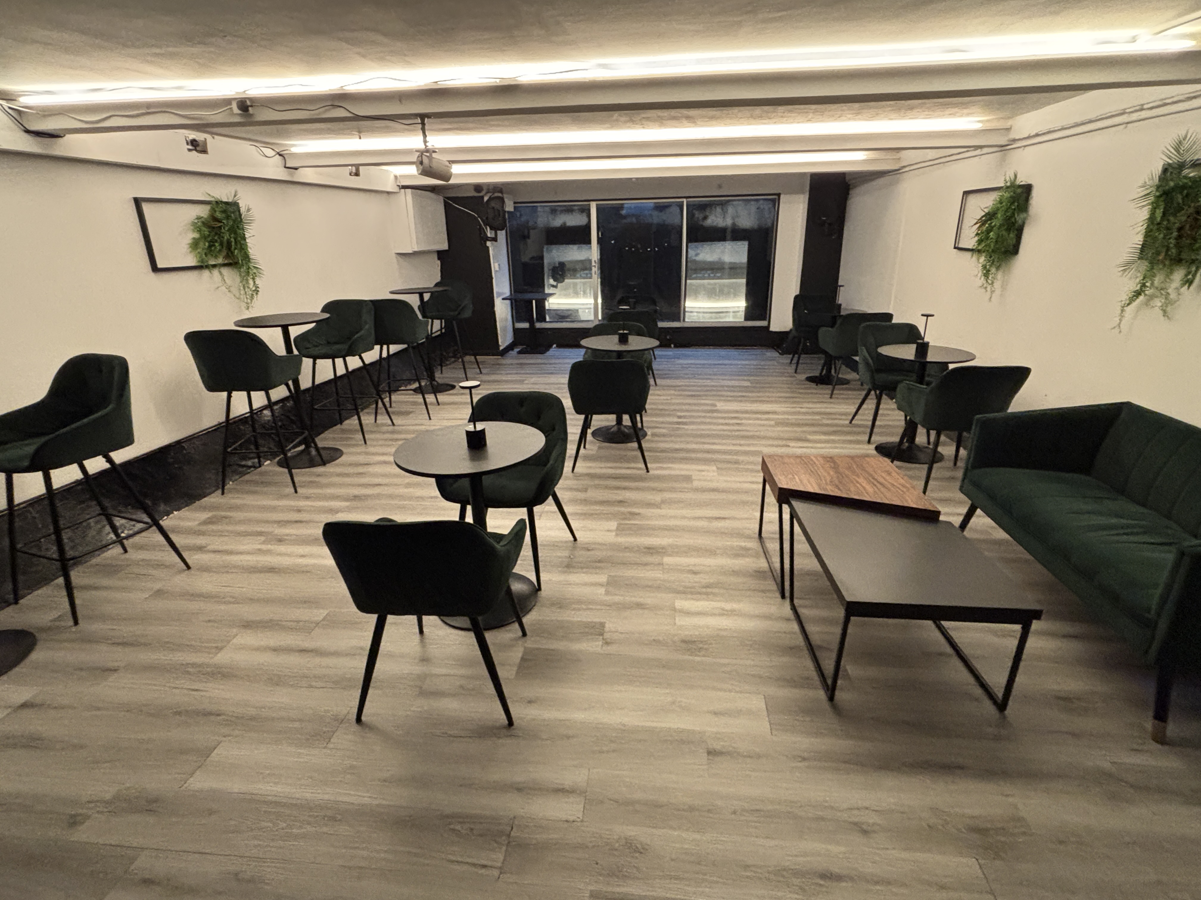 Private lounge at No.22 Kitchen & Bar with modern seating for networking and breakout events.