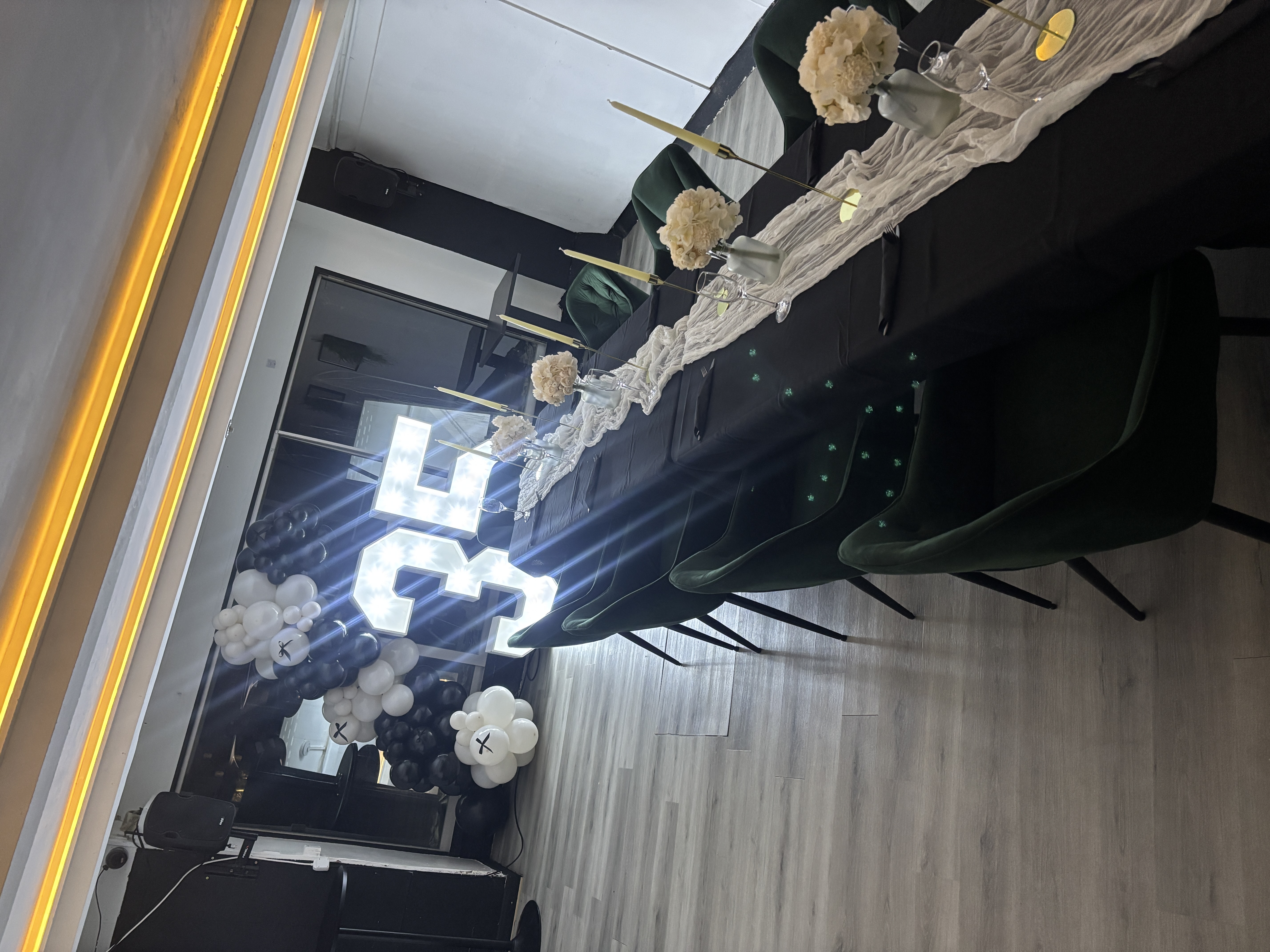 Private event space at No.22 Kitchen & Bar with marquee 35 signage for milestone celebrations.