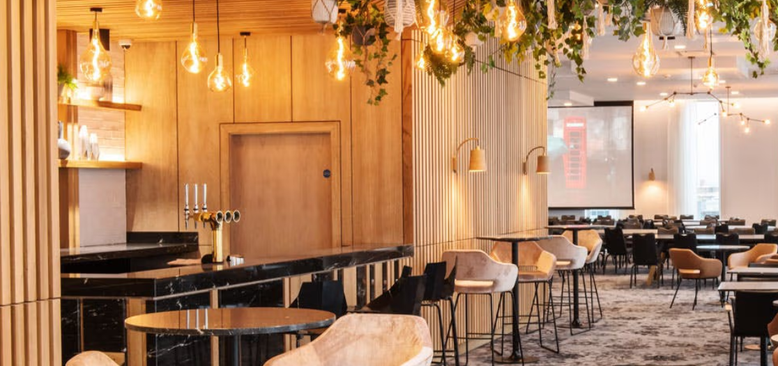 Elegant meeting space at voco Manchester City Centre for corporate events and gatherings.