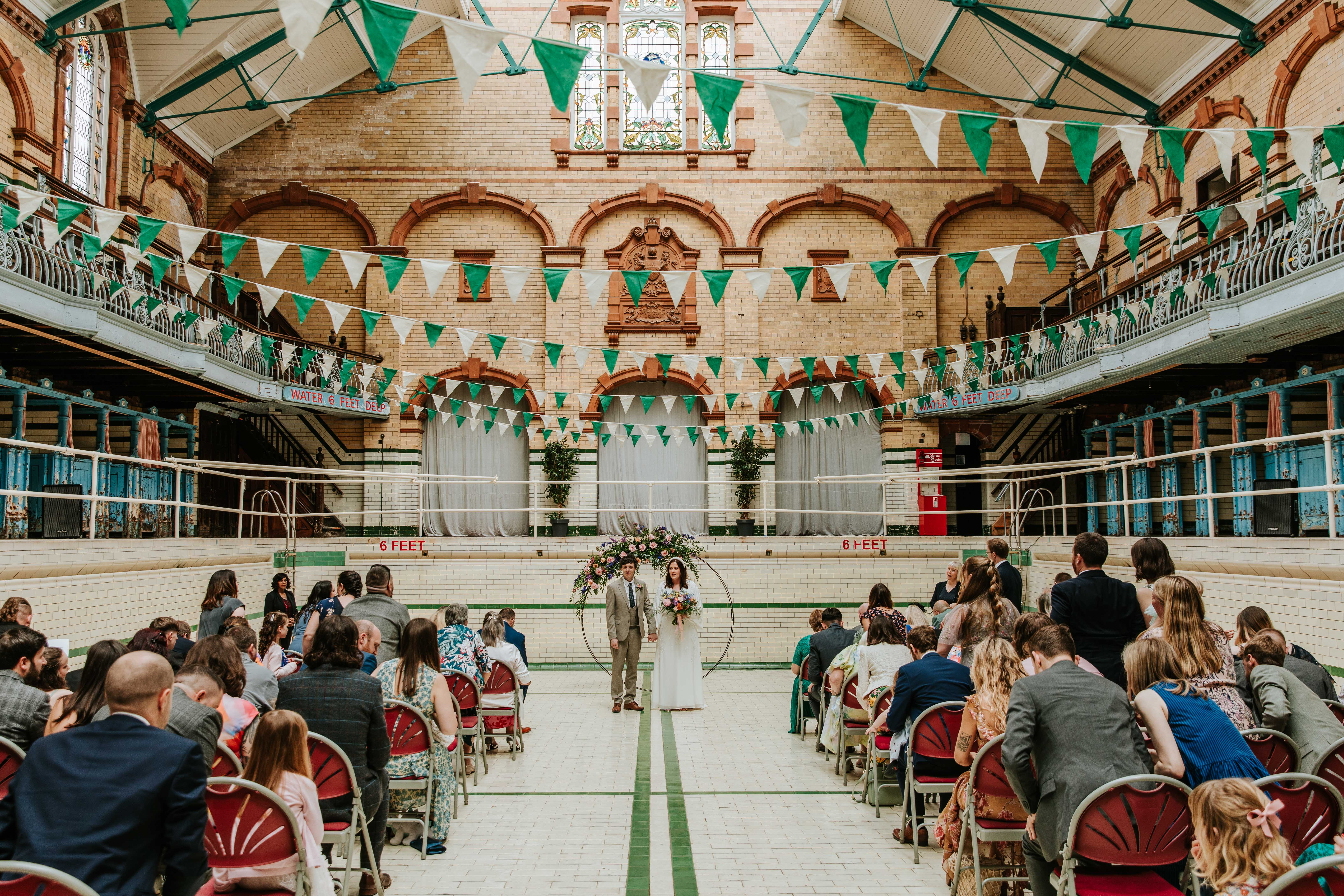 Sunken Gala Pool ceremony space at Victoria Baths for unique industrial wedding and event venue.