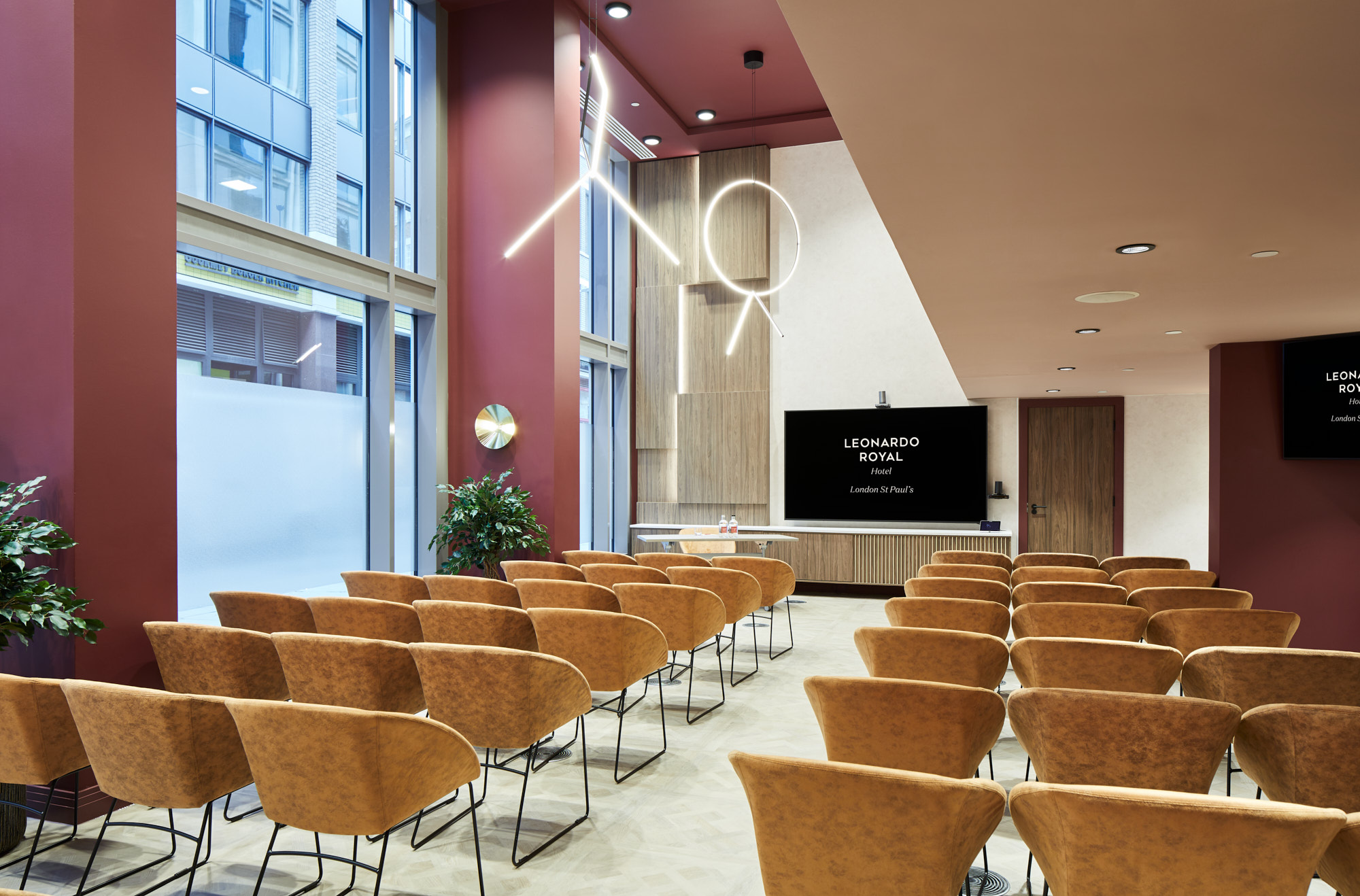Modern meeting room at Leonardo Royal Hotel, ideal for corporate events and workshops.