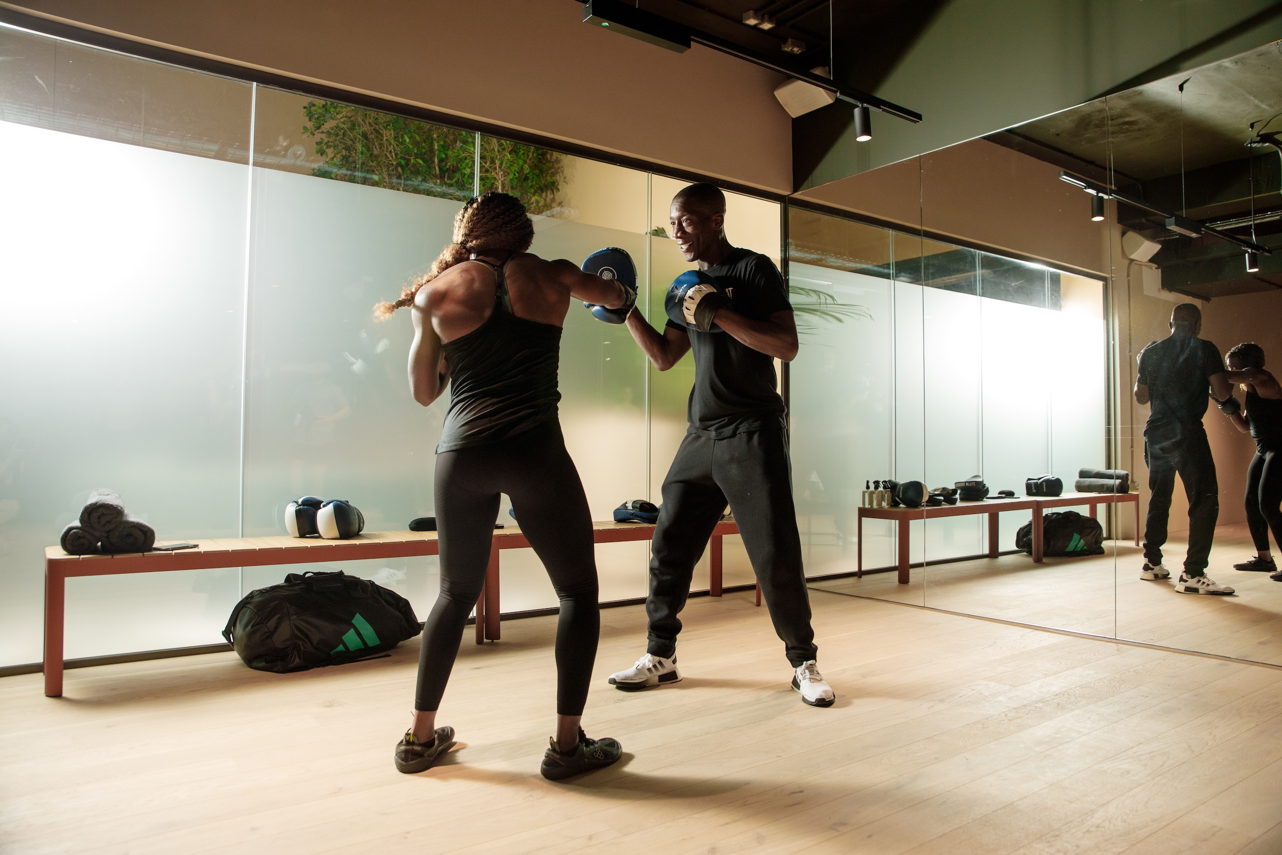 Dynamic training session at Wellness Studio, Uncommon Holborn - corporate wellness retreats.