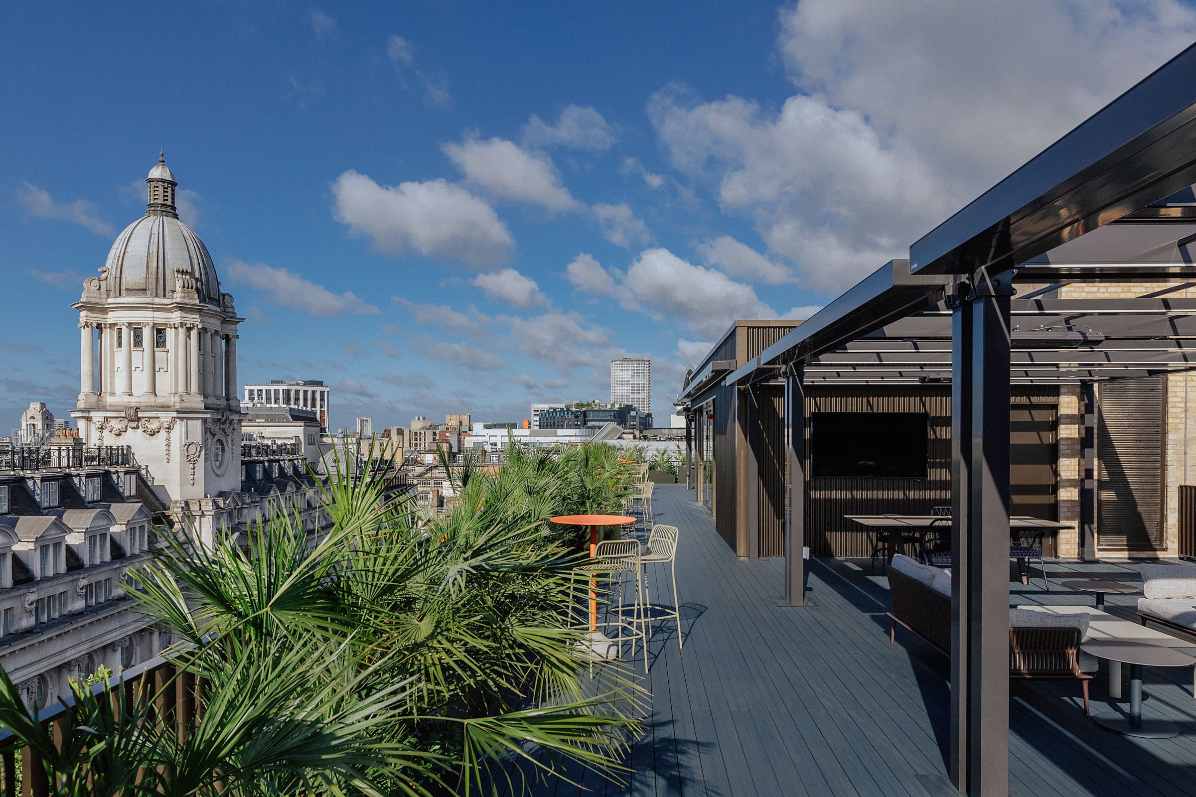Central London rooftop venue with city skyline view for upscale events and gatherings.