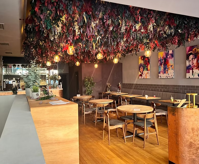 Bistro-style Blackheath House venue with artistic lighting for corporate networking and receptions.