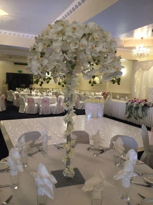 Elegant banquet hall with lavish decor for weddings and upscale gatherings.