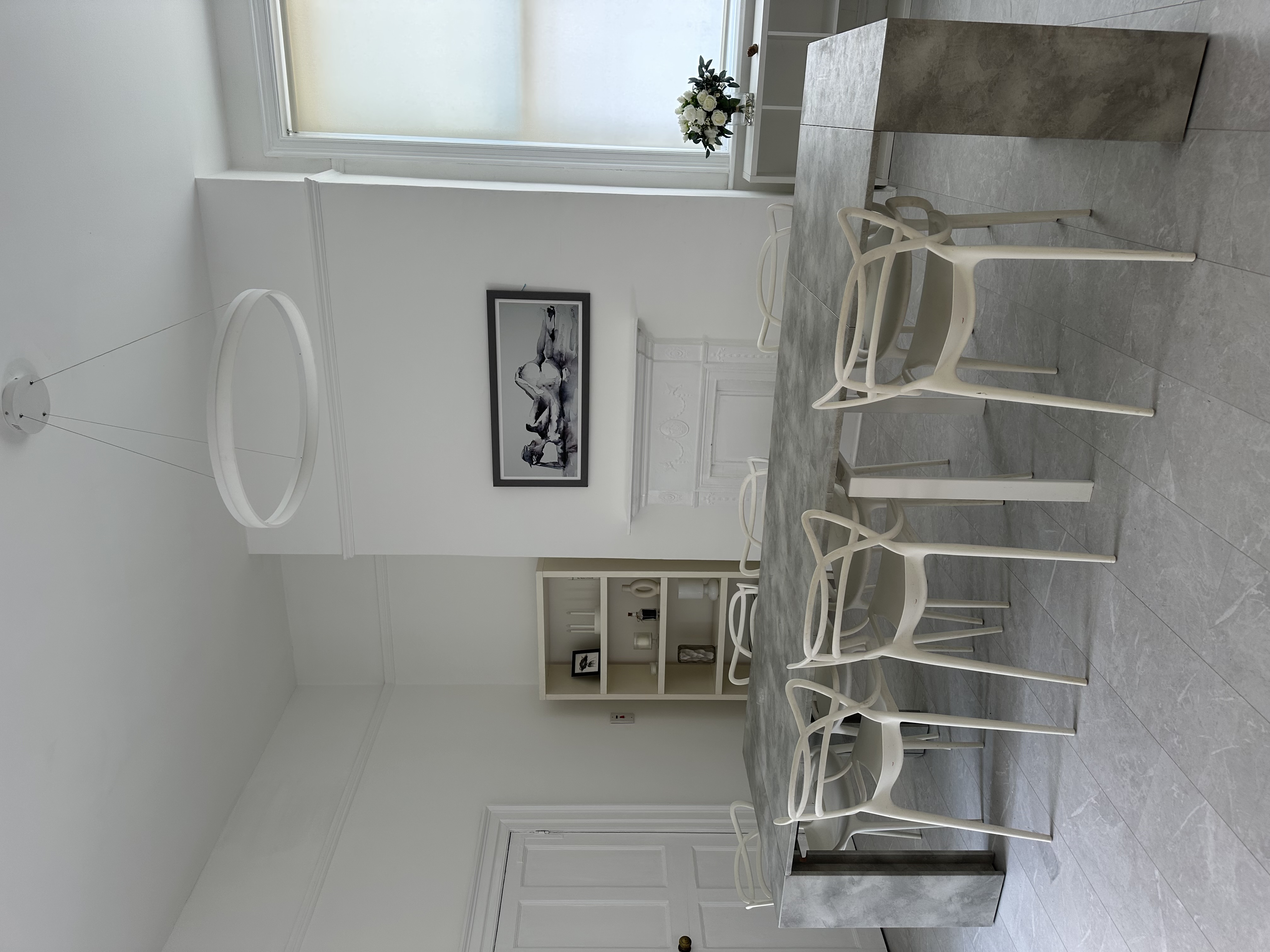 Minimalist boardroom at 6 Kings Buildings featuring bold art for creative workshops and strategy.