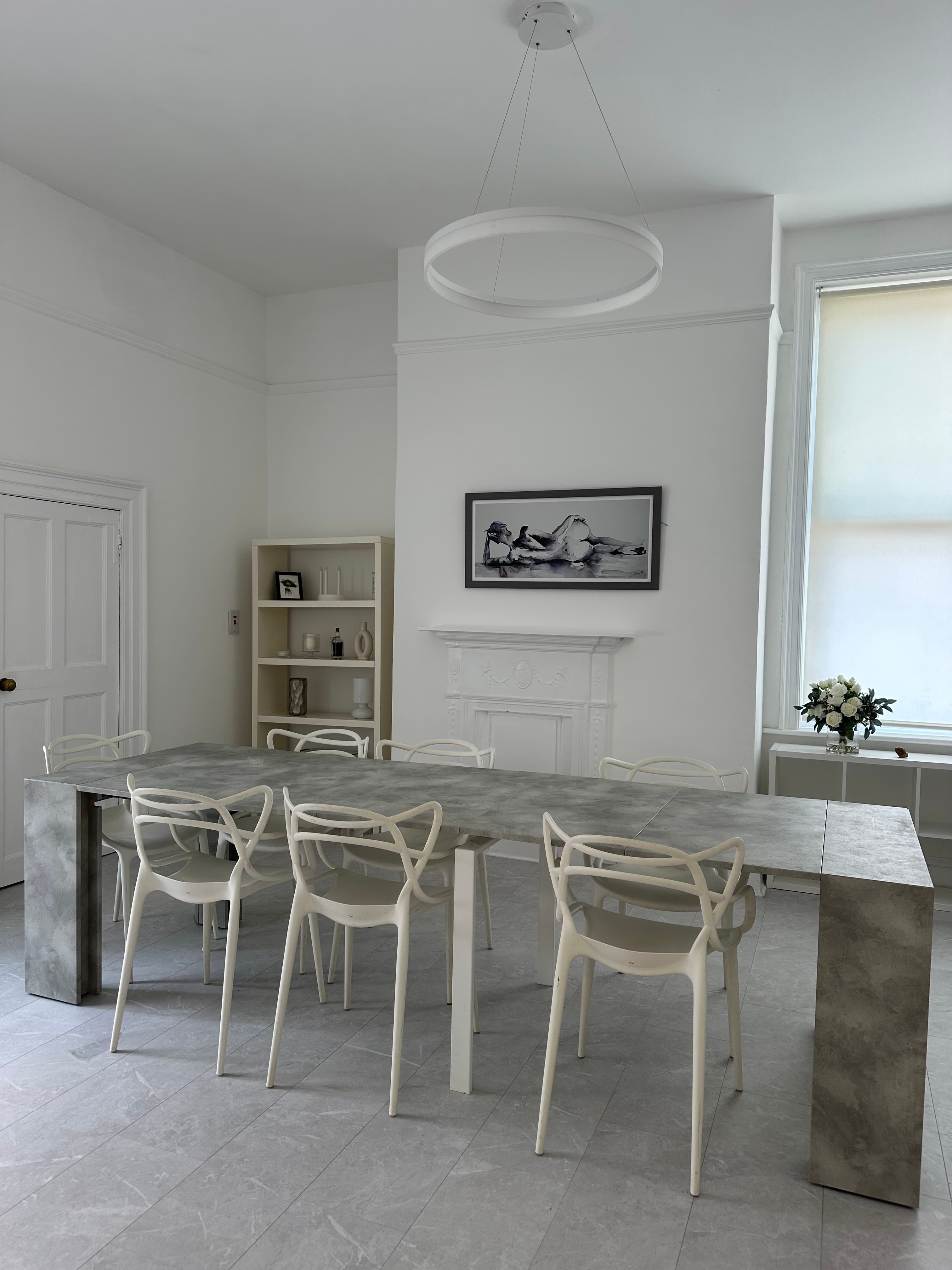 Minimalist boardroom at 6 Kings Buildings for strategy meetings and corporate workshops.